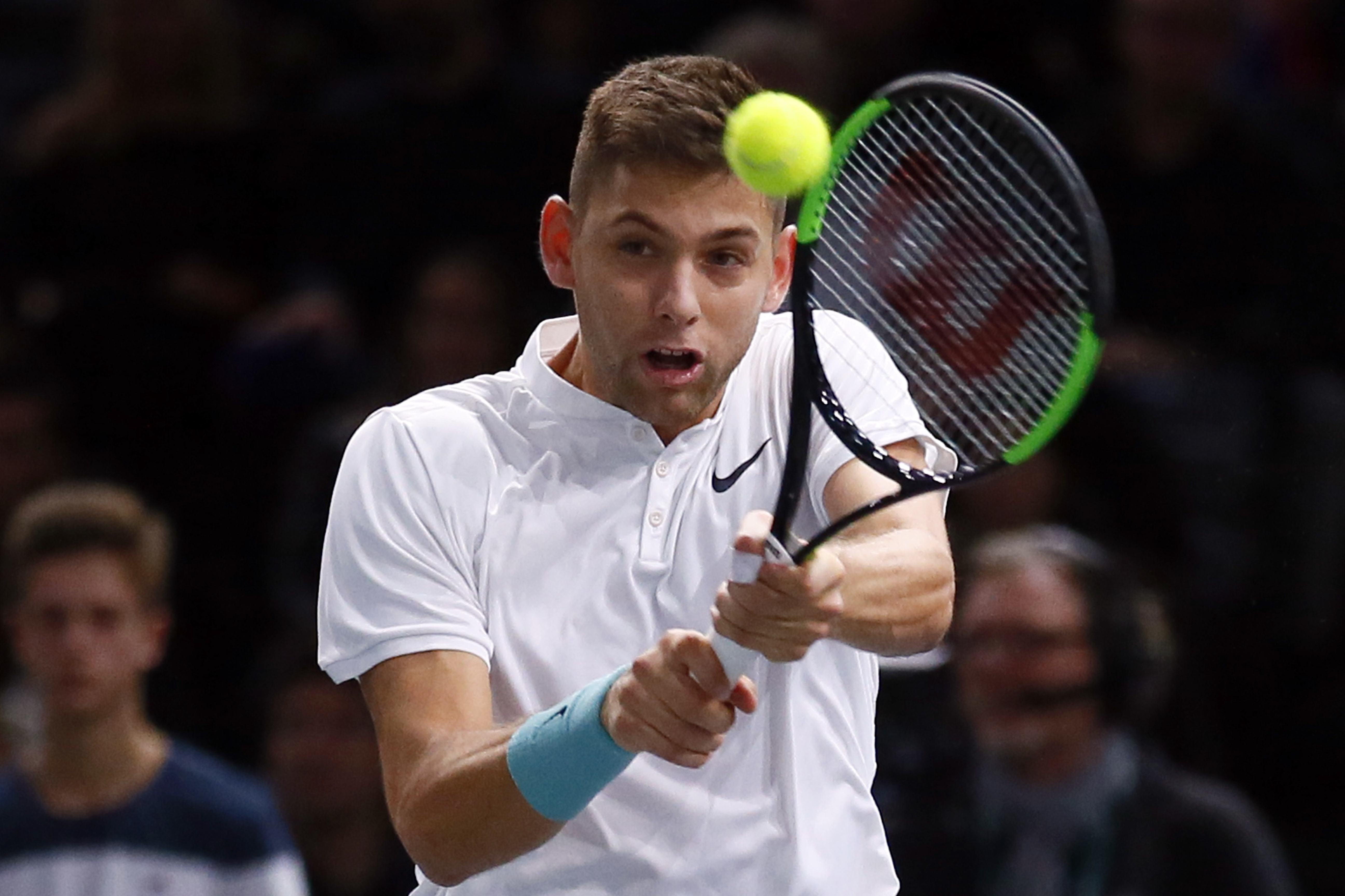 Krajinovic upsets Isner to face Sock in Paris Masters final