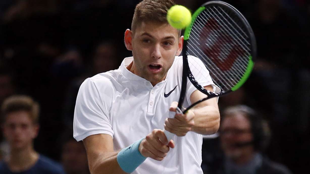 Krajinovic upsets Isner to face Sock in Paris Masters final
