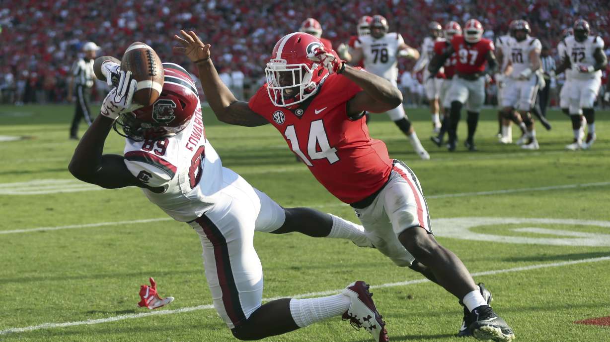 Fromm's 2 TD passes lead No. 2 Georgia past Gamecocks 24-10
