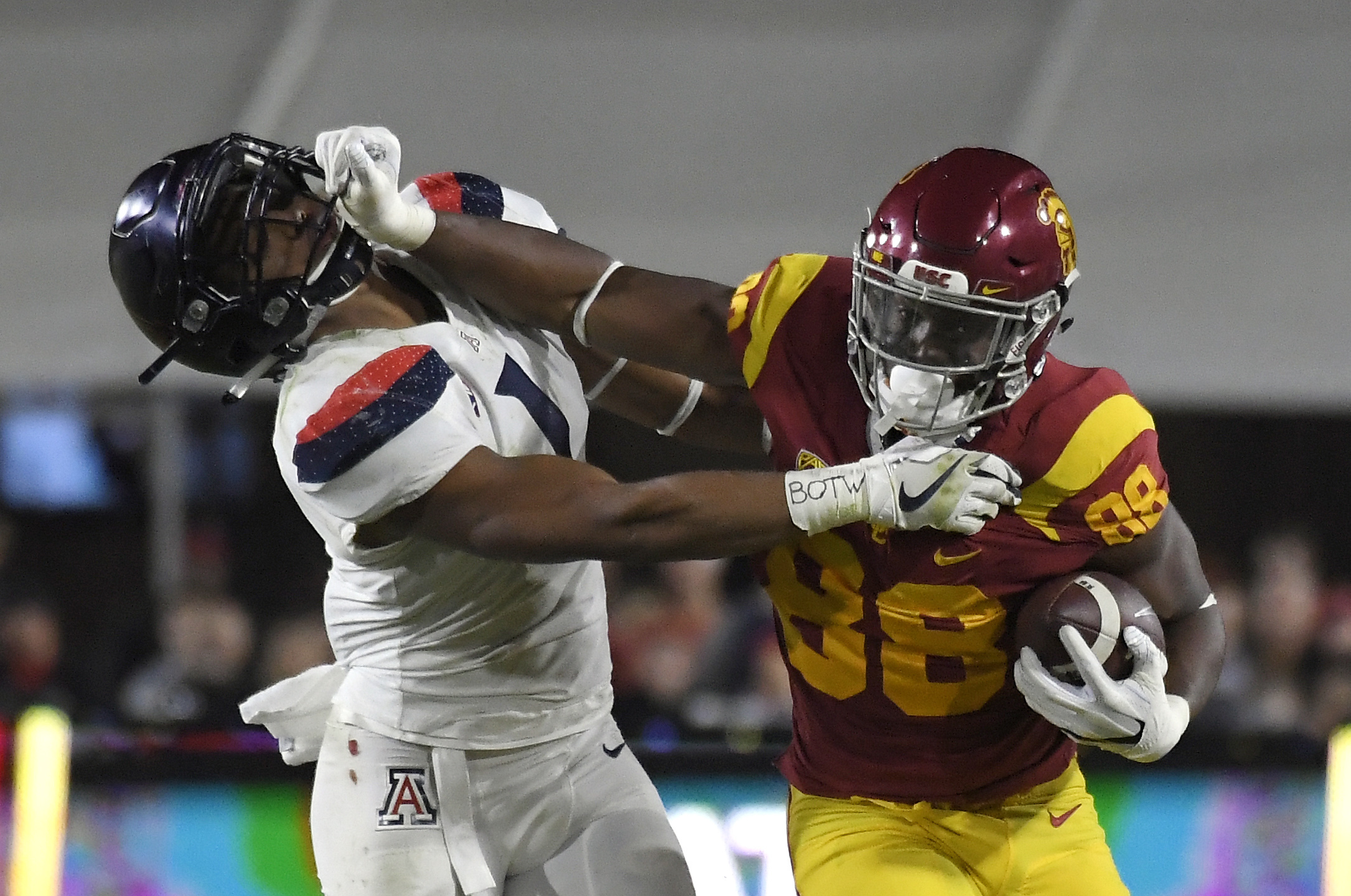 Jones runs wild late, No. 17 USC beats No. 23 Arizona 49-35