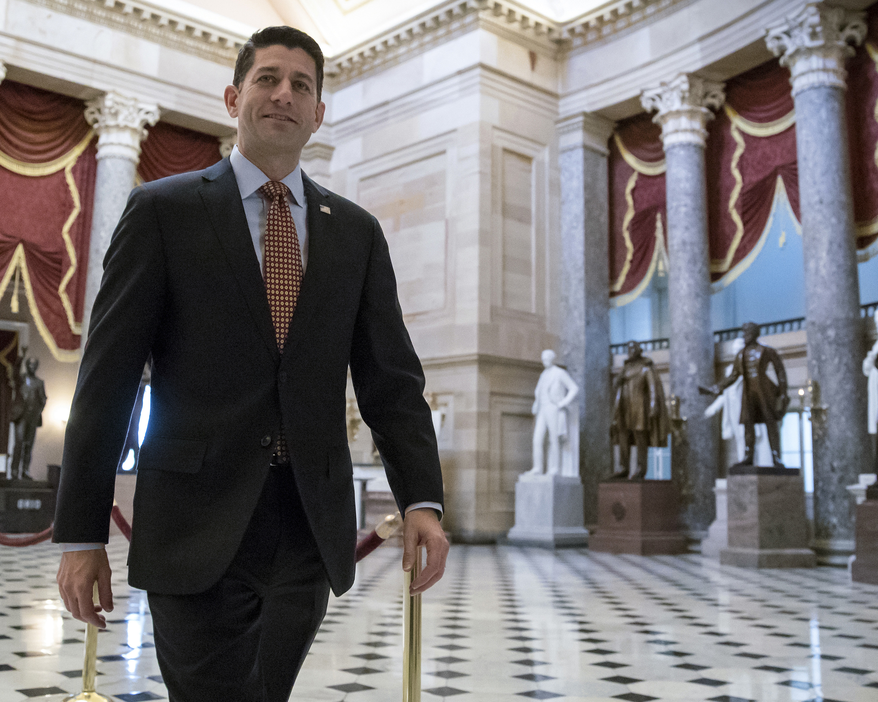 The Latest: House panel backs late changes to tax proposal