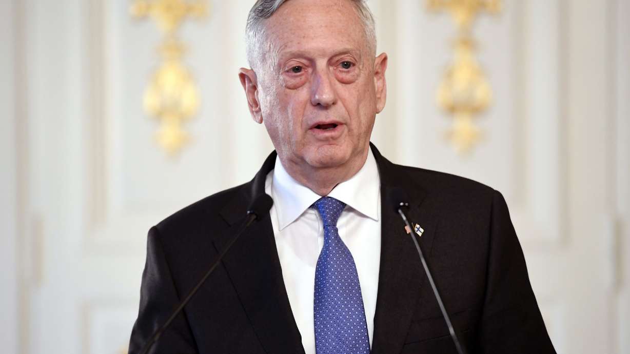The Latest: Pentagon knew of lapses reporting crimes to FBI