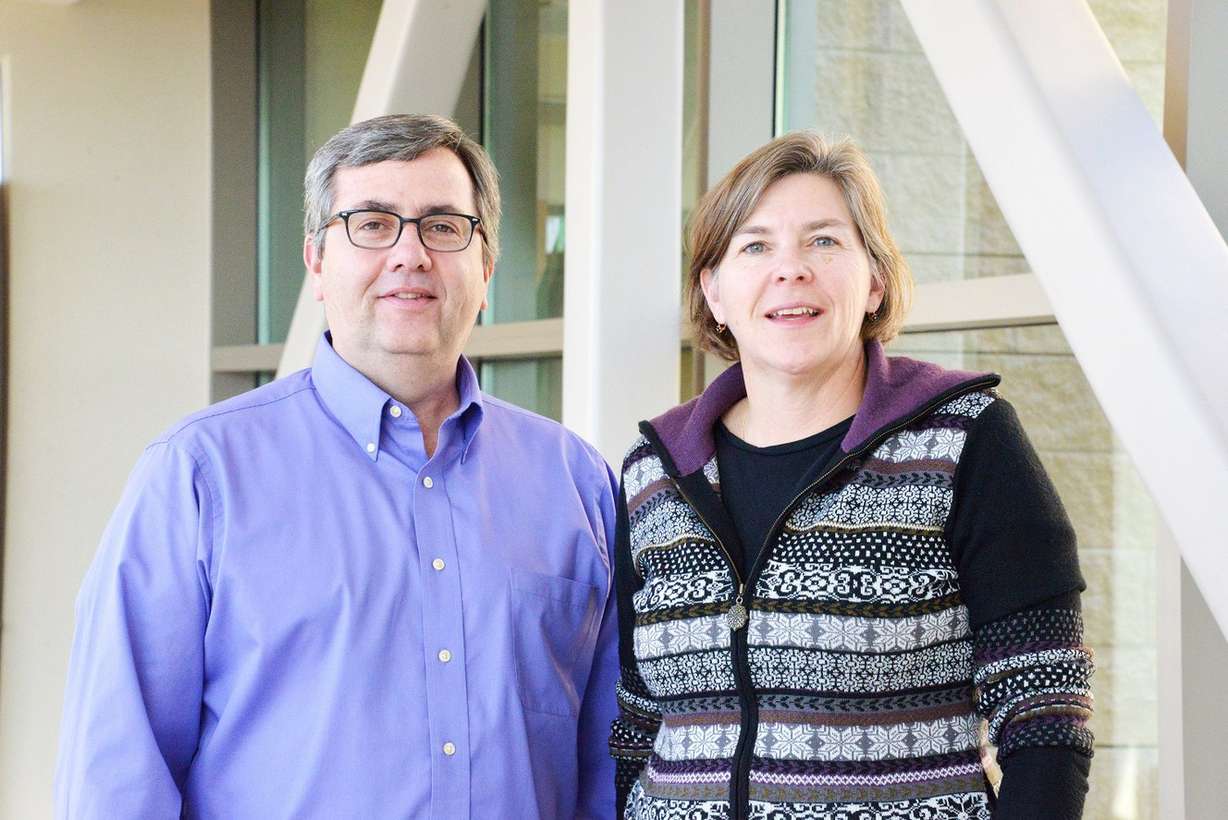 Researchers Deborah Neklason, right, and Don Delker have found that a potent prevention treatment for people at enormous risk of colorectal cancer works not only by preventing new precancerous polyps from growing, but by causing existing ones to recede. Photo: Huntsman Cancer Institute