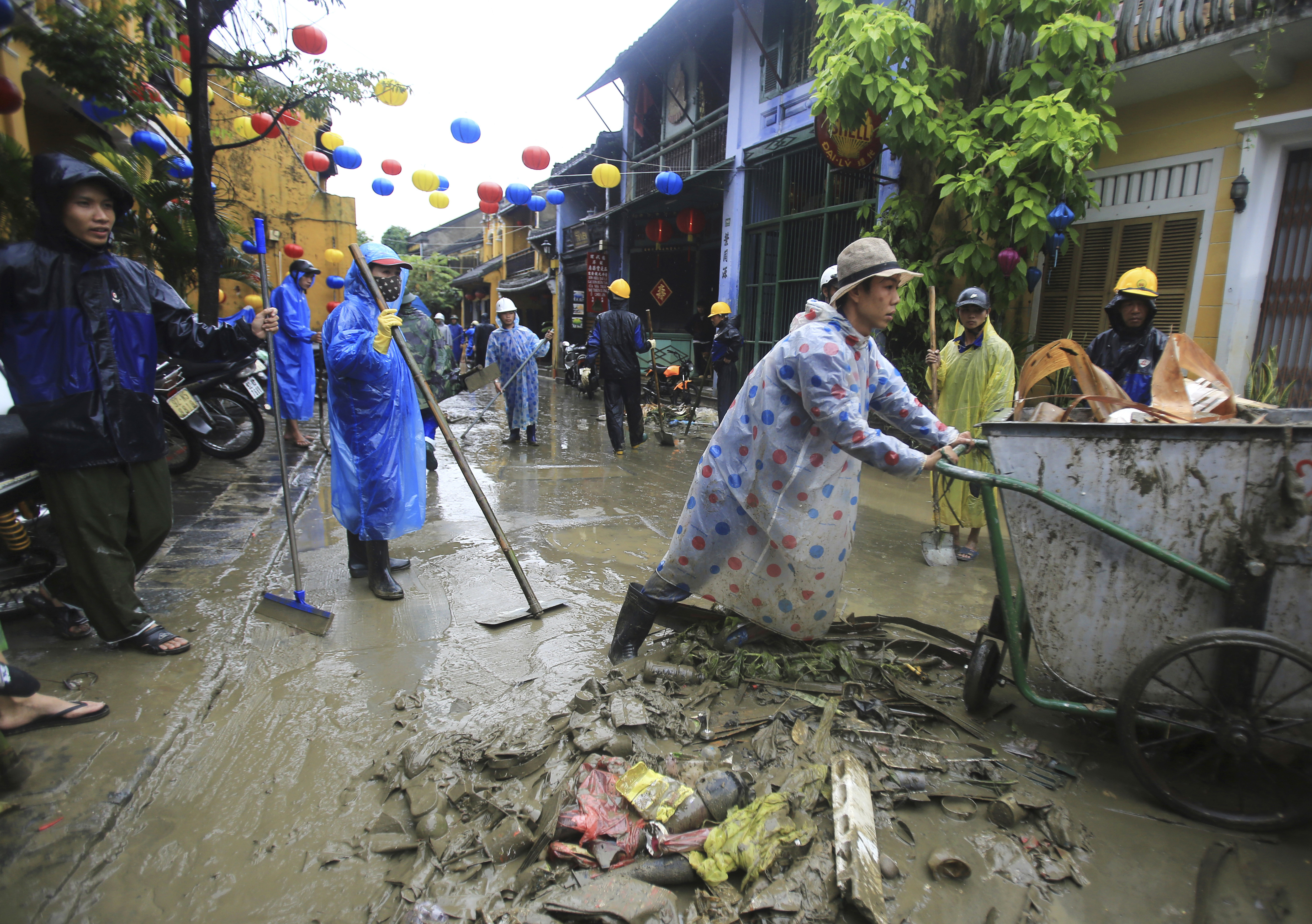 Troops, residents of Vietnam's Hoi An clean up from floods