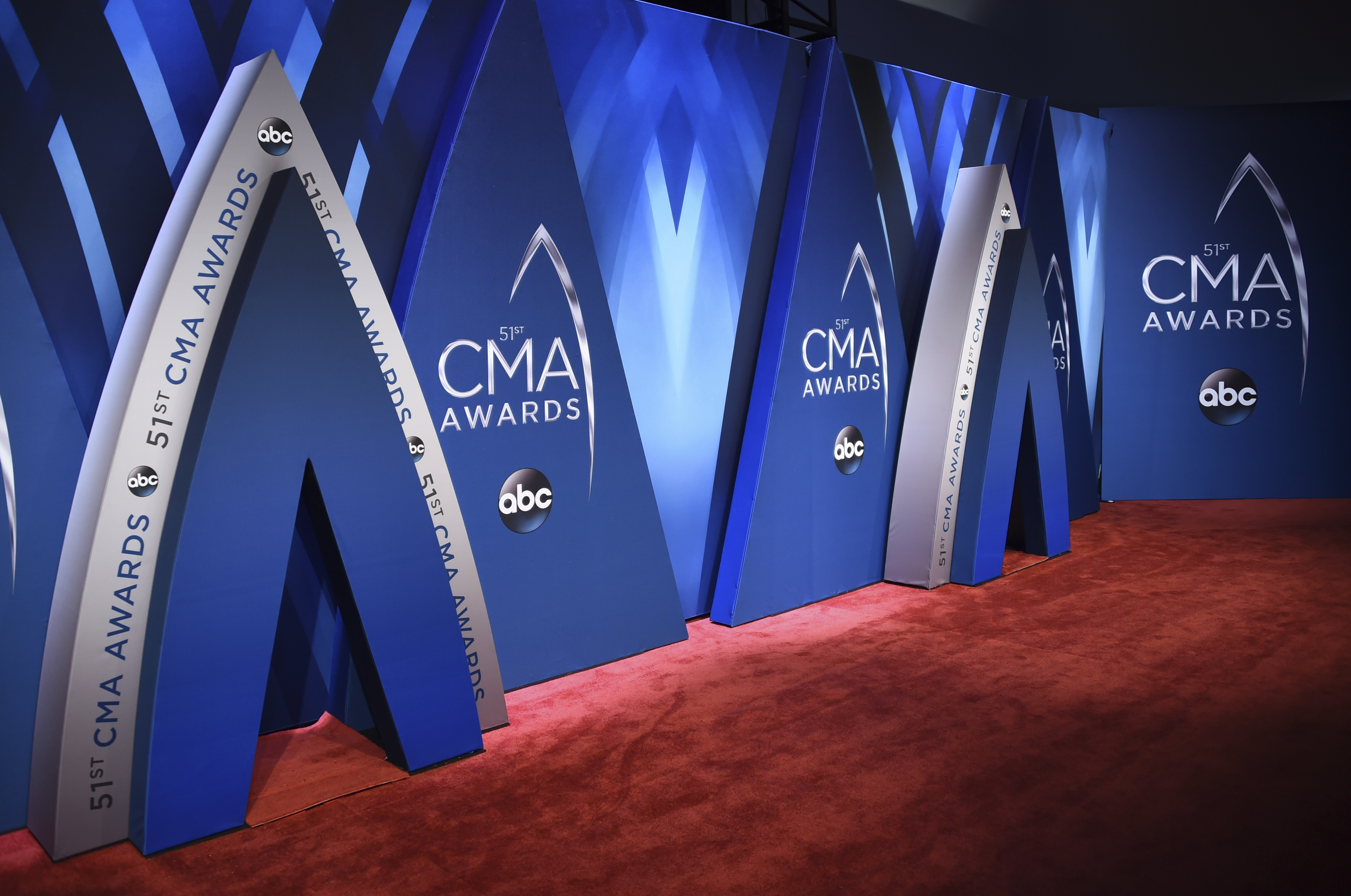 The Latest: Urban debuts new song at CMA Awards
