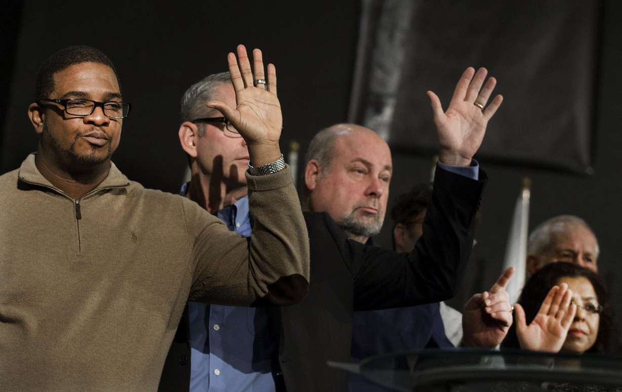 Evangelical leaders raise their hands after being asked which of them has a security team at their church following the monthly Standing Together Pastor’s Fellowship at the Salt Lake Christian Center in Salt Lake City on Thursday, Nov. 9, 2017. The members of the group discussed the recent national violence experienced in Texas, New York City and Las Vegas. (Photo: Laura Seitz, KSL)