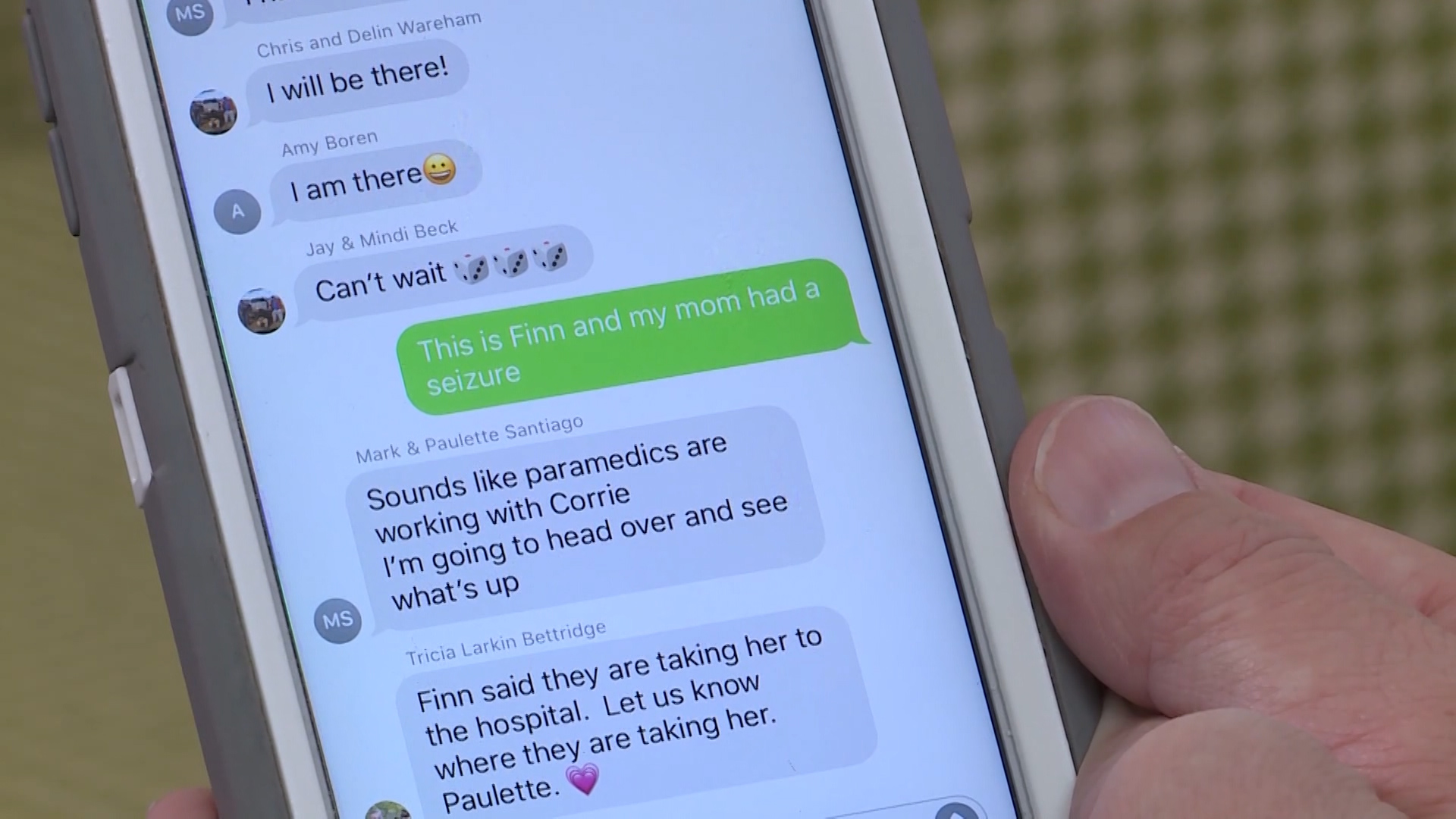 Finn Huish, 7, is being hailed a hero after quickly reacting while his mom was having a medical emergency. (KSL TV)