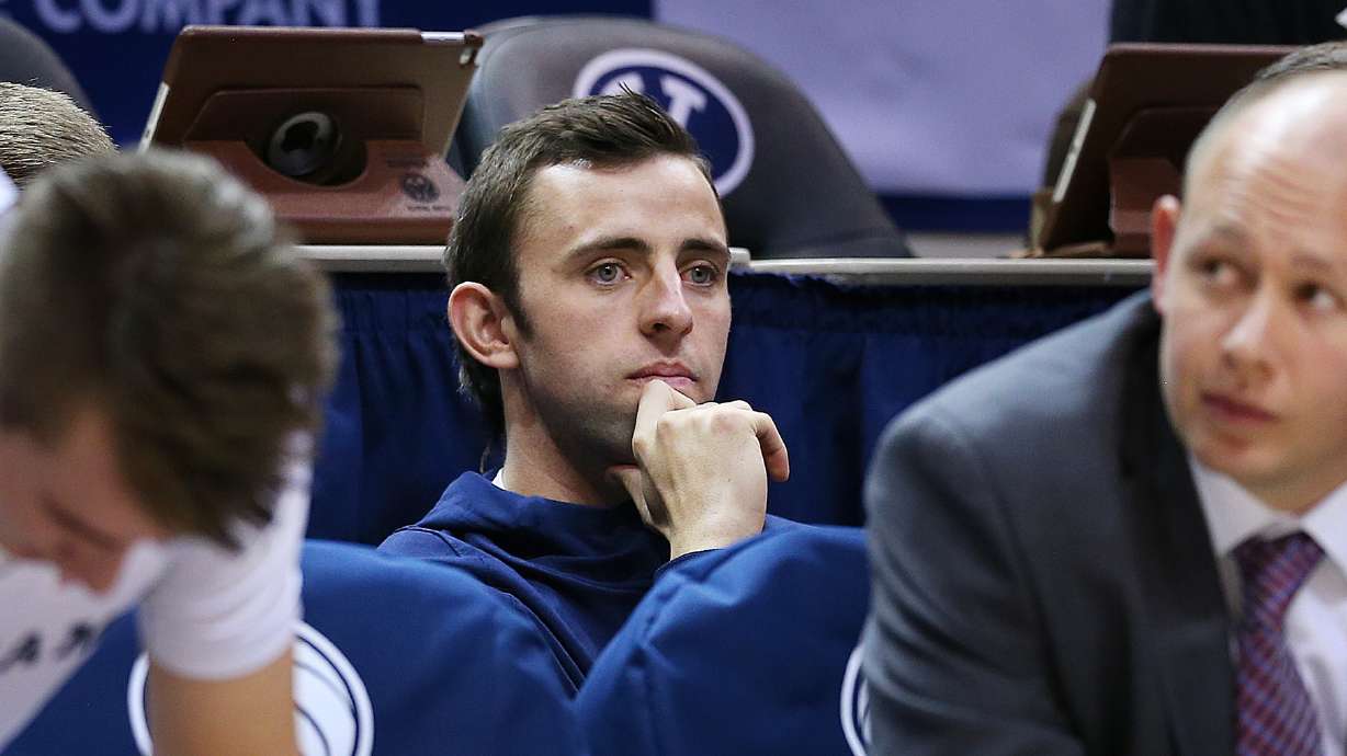 Brigham Young Cougars guard Nick Emery (4) sits on the bench watching as BYU and Colorado College play at the Marriott Center in Provo on Wednesday, Nov. 8, 2017.