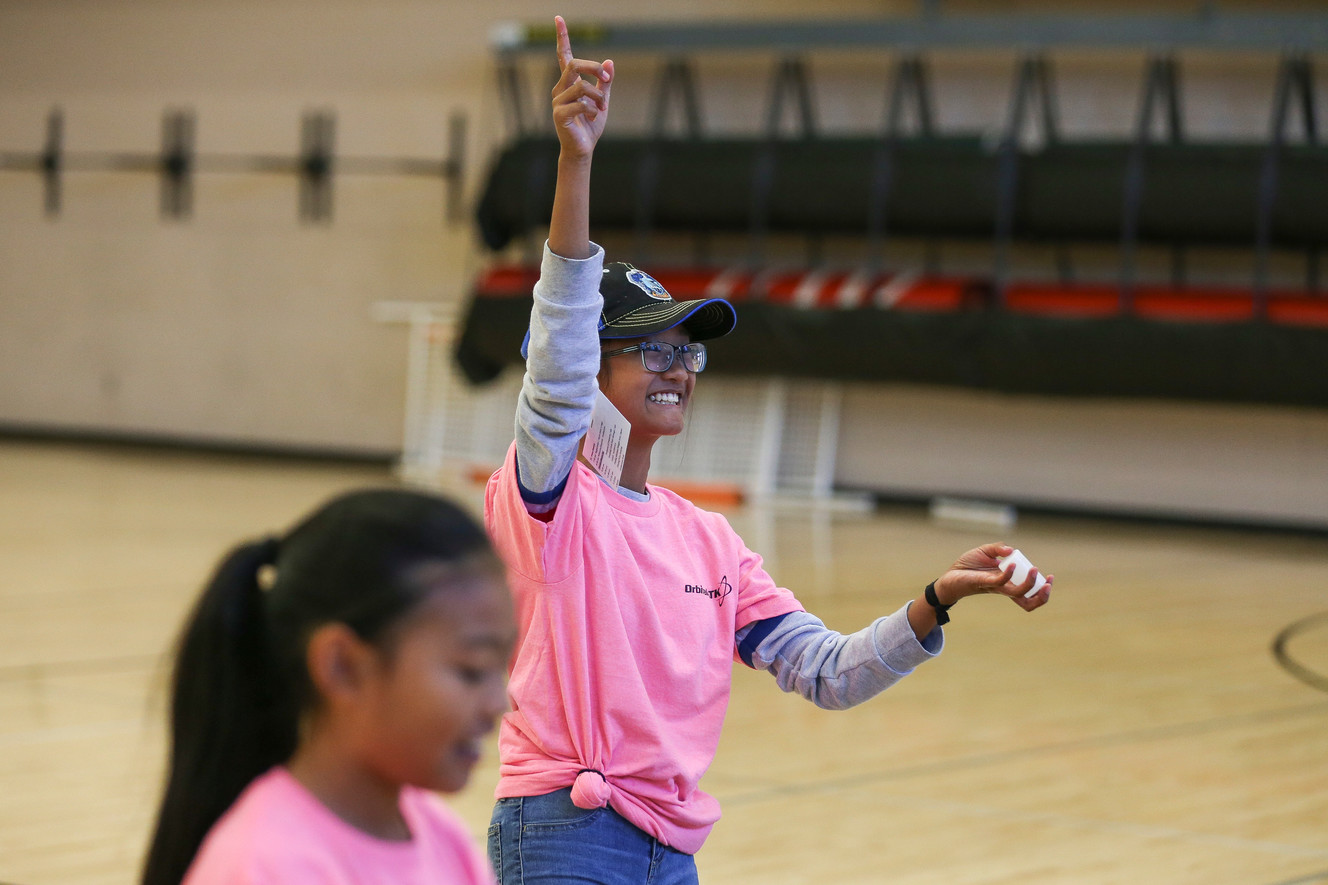 Kiana Madrid reacts after launching a rocket propelled by soda and Mentos at the Expanding Your Horizons Conference at North Davis Junior High in Clearfield on Saturday, Nov. 11, 2017. (Photo: Spenser Heaps, KSL)