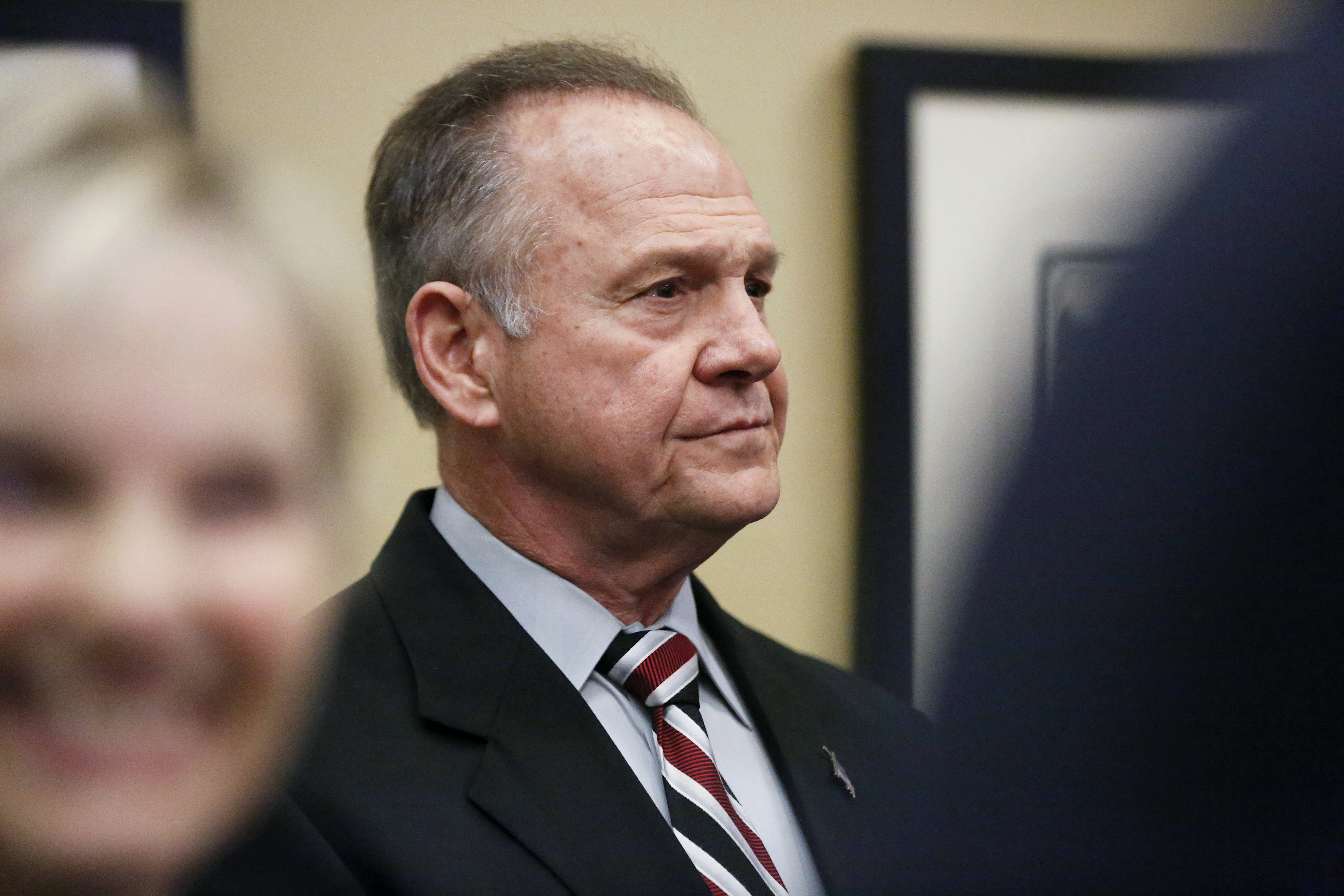Moore dismisses allegations in story, says lawsuit to come