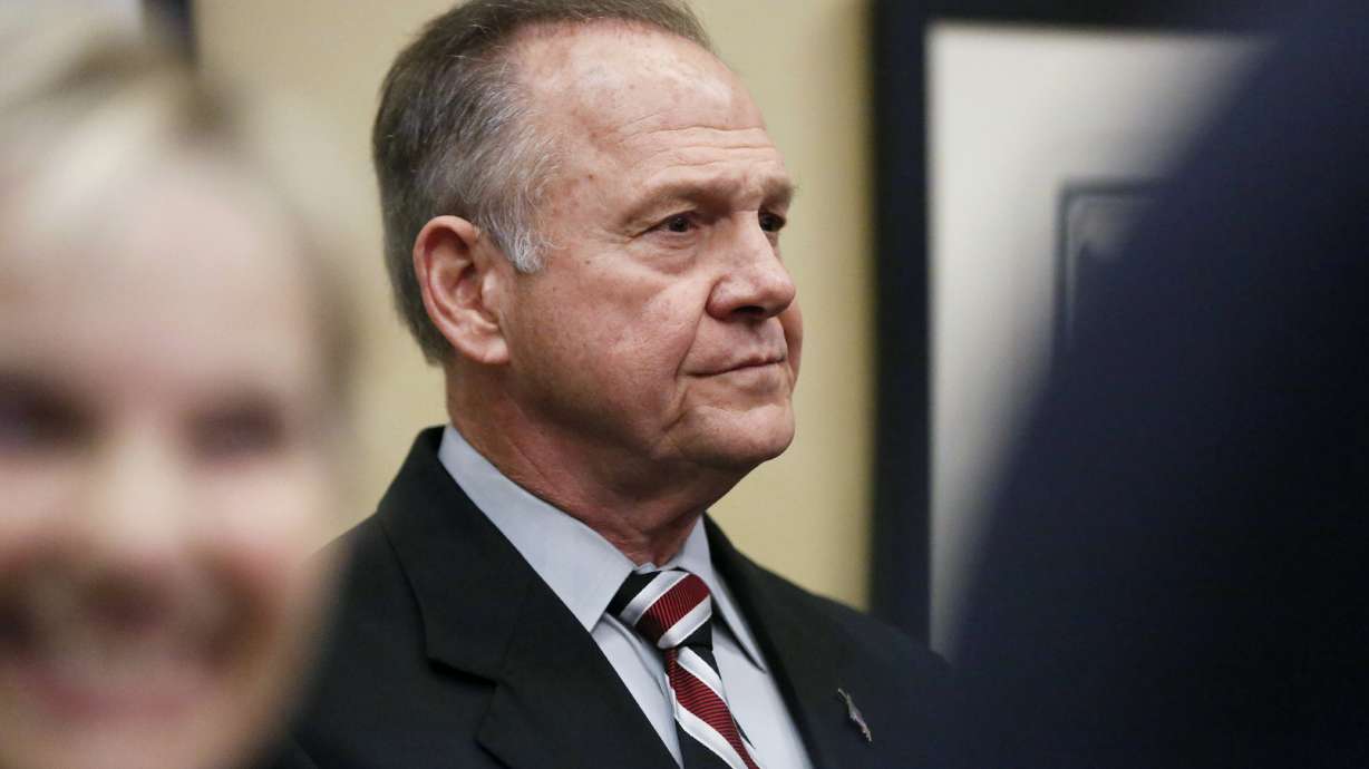 Moore dismisses allegations in story, says lawsuit to come