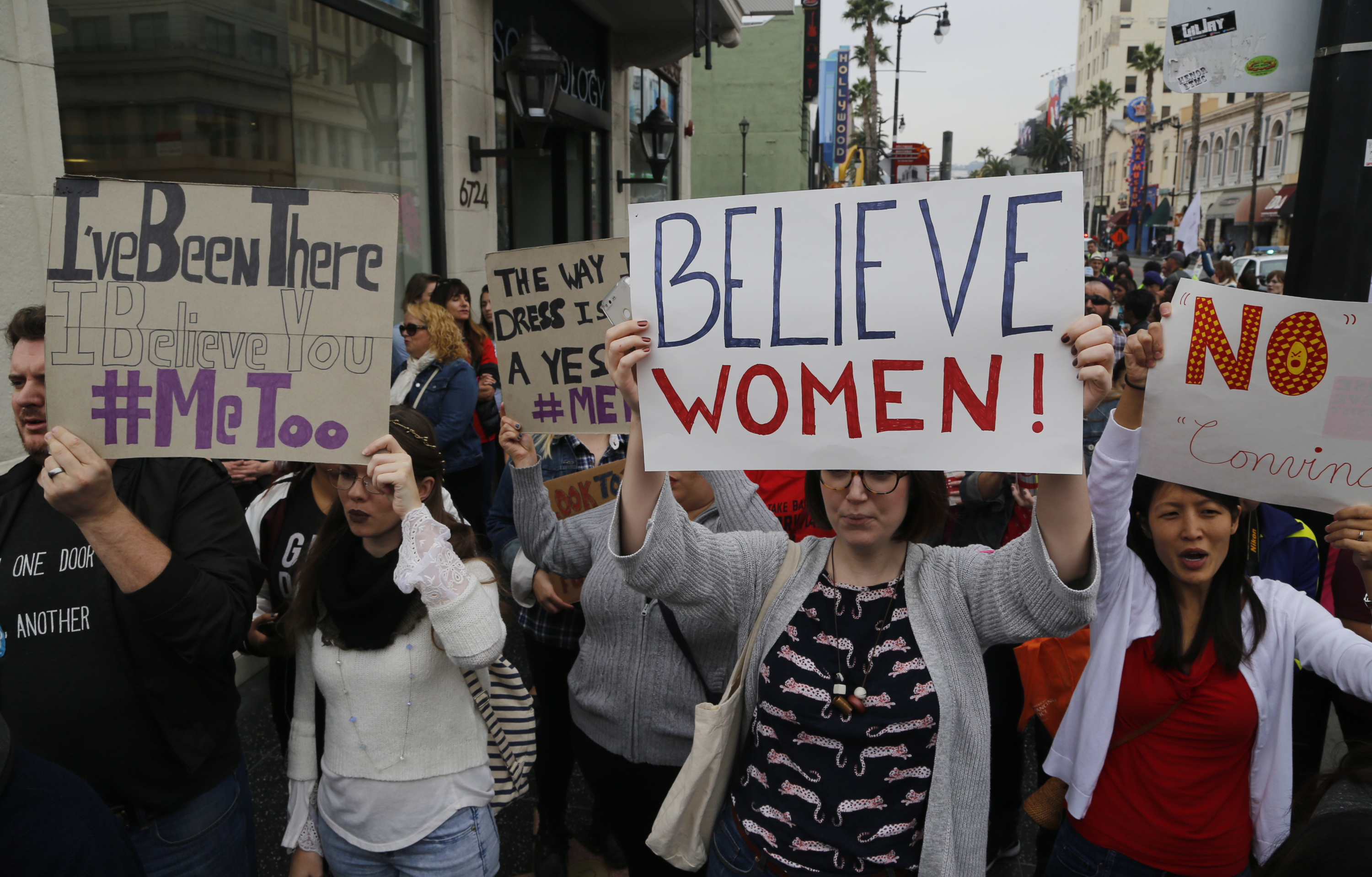 Participants march against sexual assault and harassment at the #MeToo March in the Hollywood section of Los Angeles on Sunday, Nov. 12, 2017. (AP Photo/Damian Dovarganes)