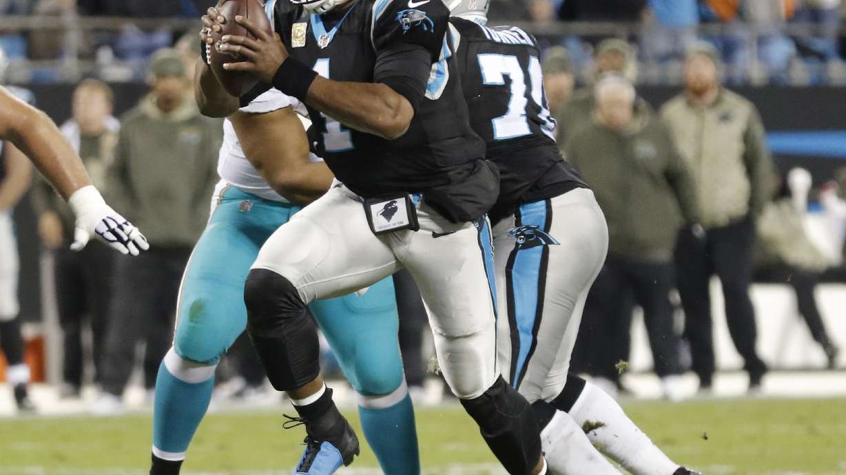 Newton, Panthers hammer Dolphins 45-21 for 3rd straight win