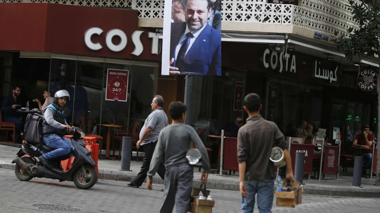 Resigned PM tells Lebanese to 'chill,' says he's coming home