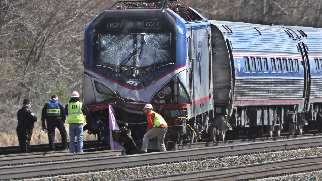 The Latest: Amtrak says safety improving after fatal crash