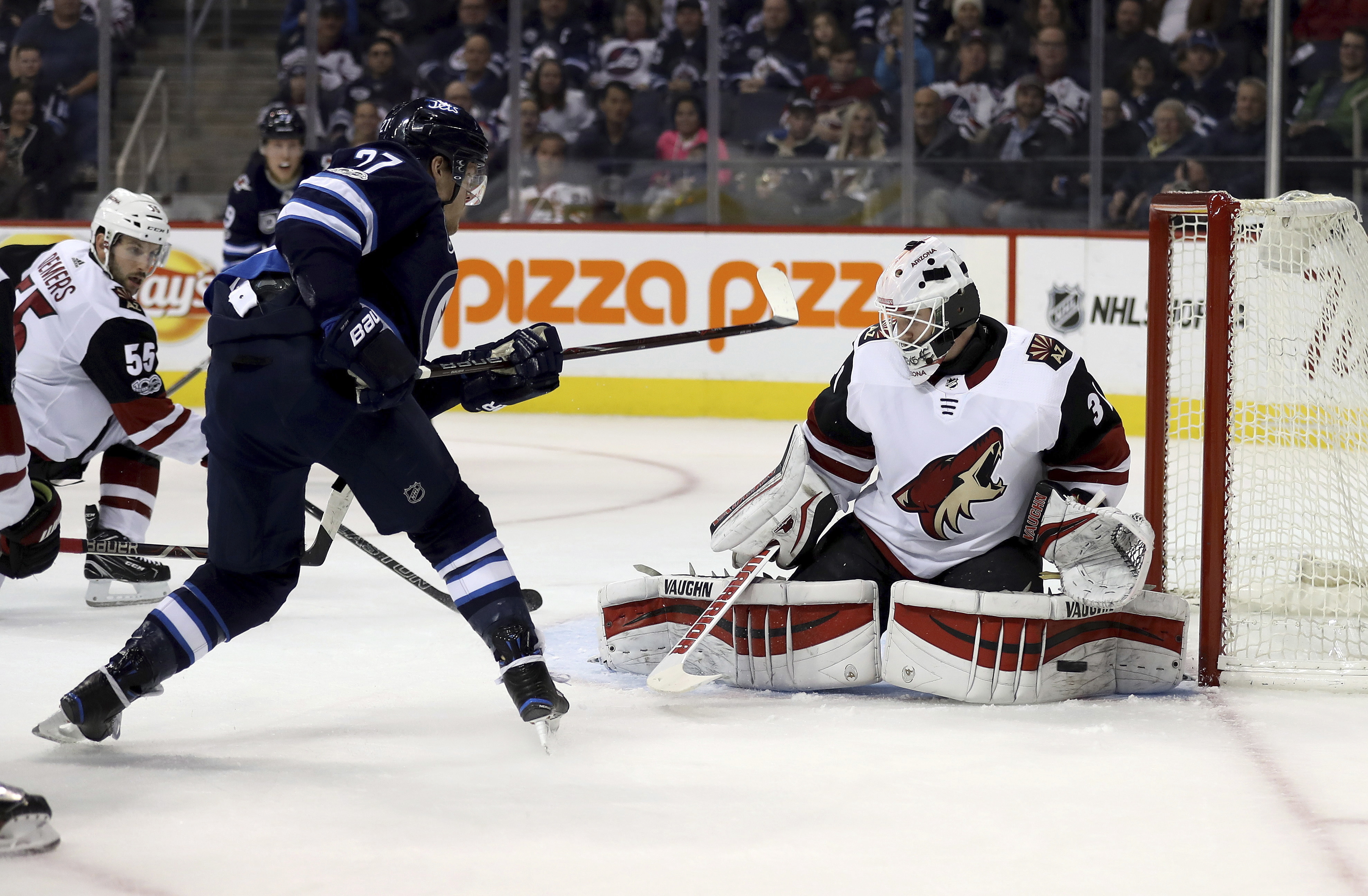 Hellebuyck's 32 saves lead Jets over Coyotes 4-1