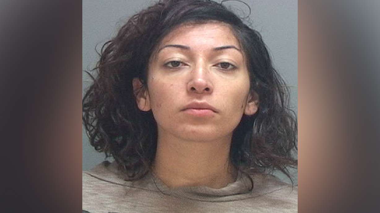 Charge: Salt Lake woman tried to kill neighbor with scissors