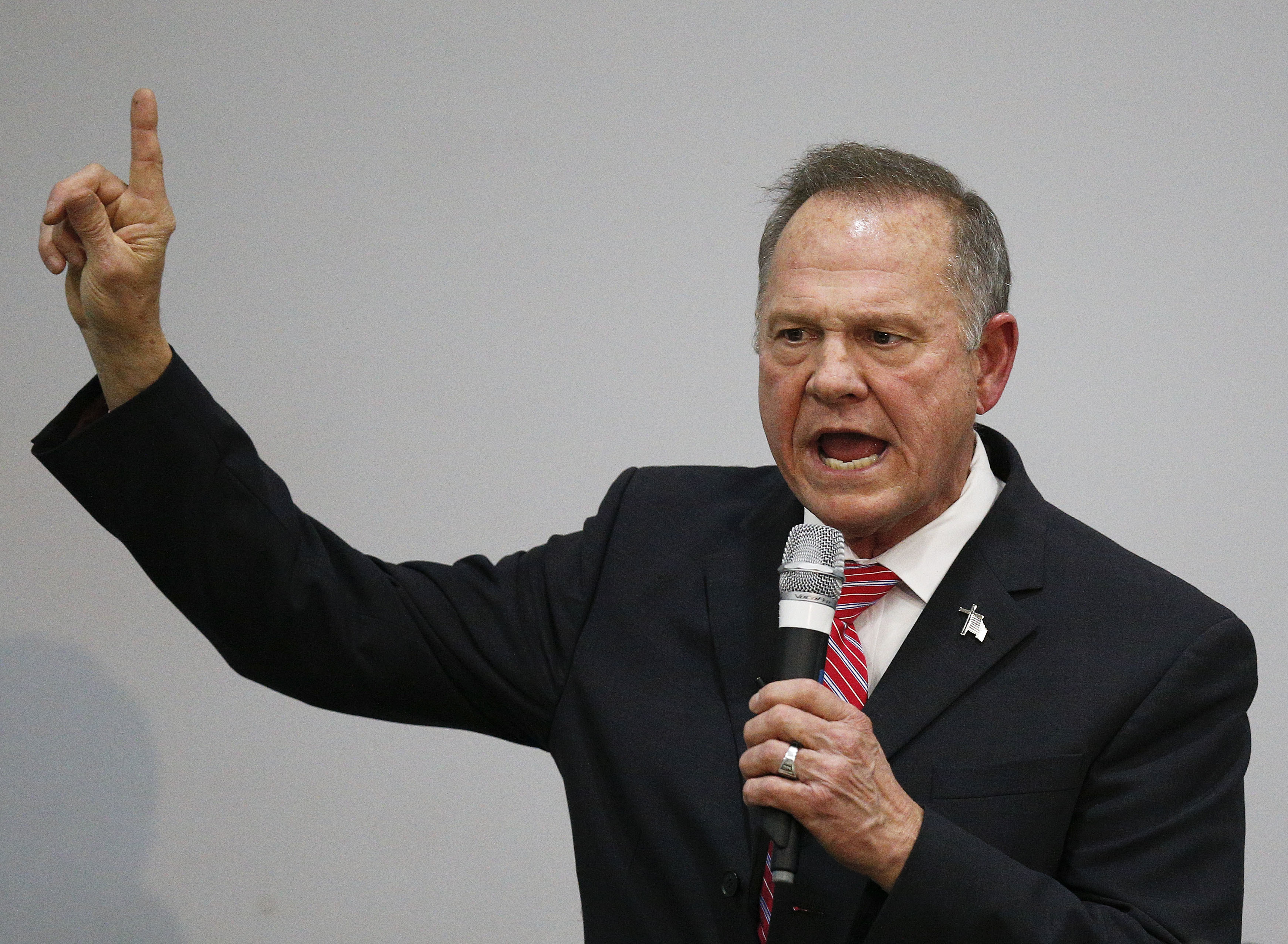 Moore targets female accusers as critics decry intimidation