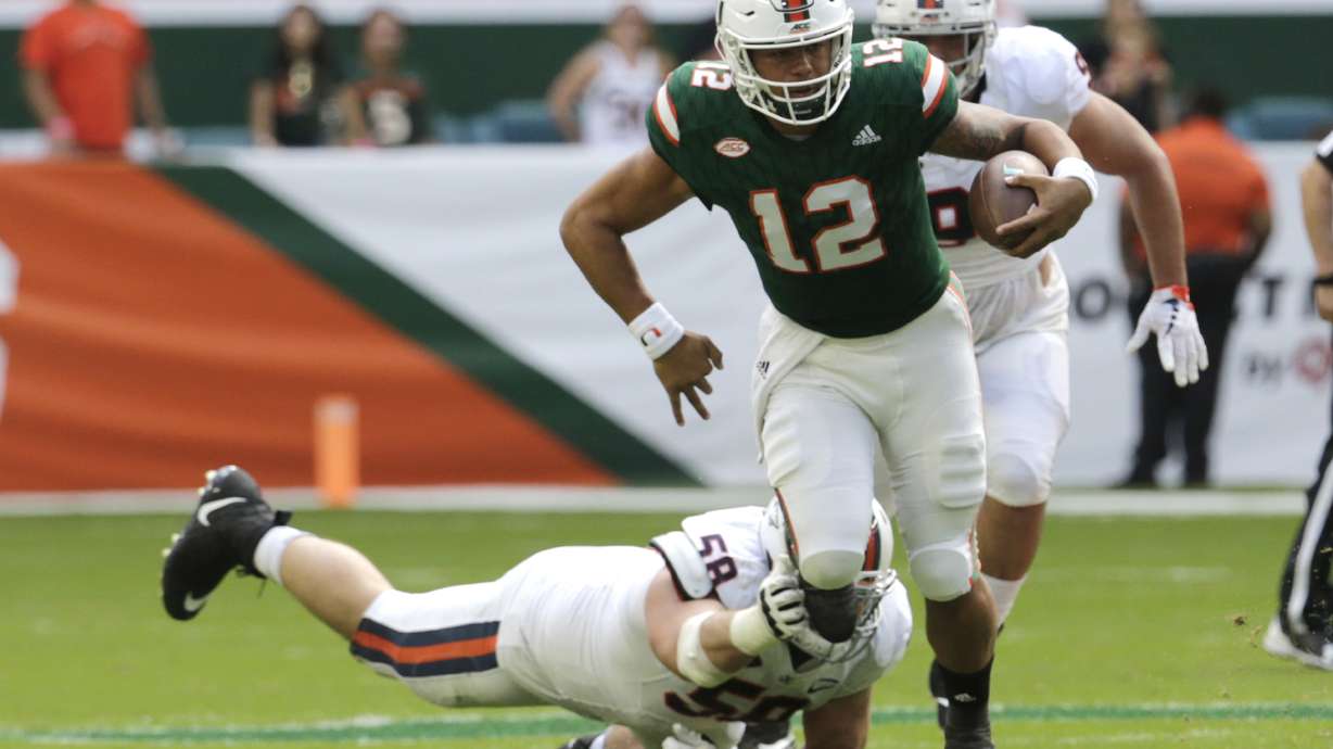 No. 2 Miami finishes on 30-0 run, tops Virginia 44-28