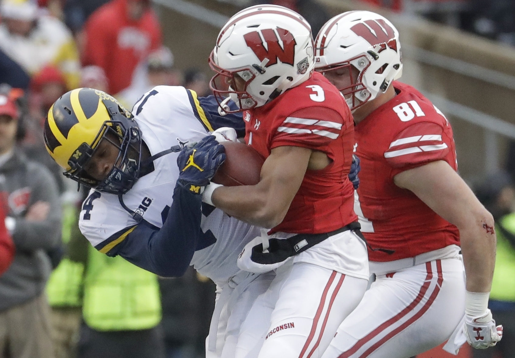 No. 5 Wisconsin wins slugfest against No. 19 Michigan 24-10