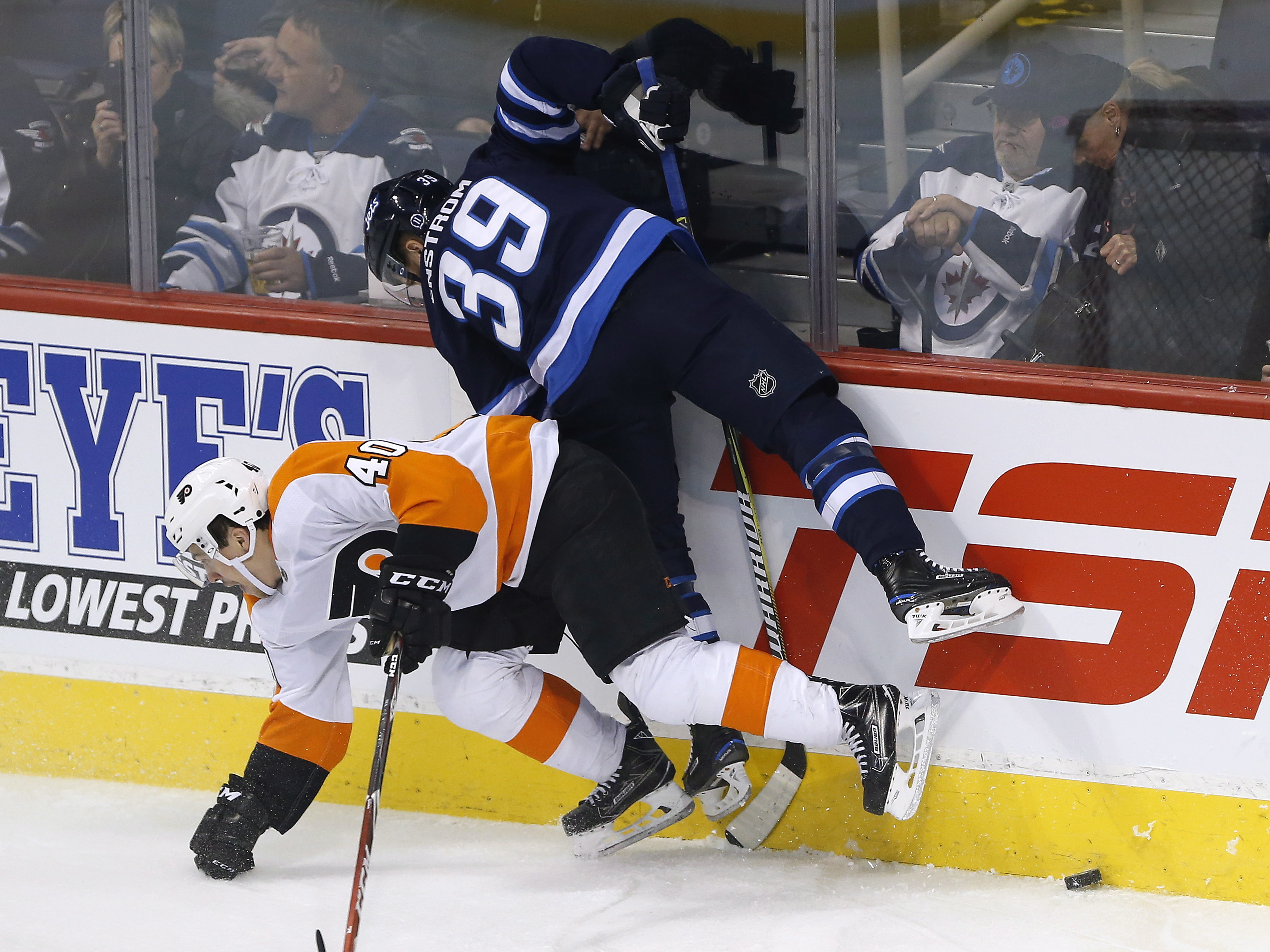 Jets defenseman Enstrom out 8 weeks with a lower-body injury