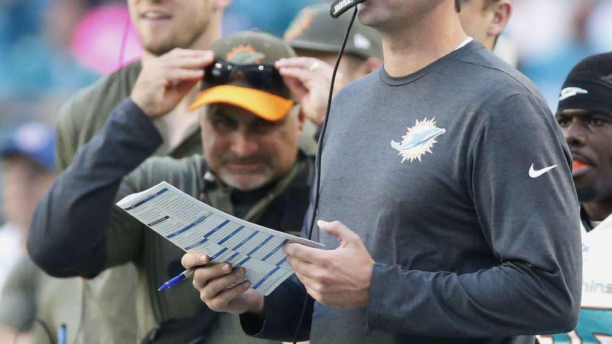 QB for reeling Dolphins uncertain against Patriots