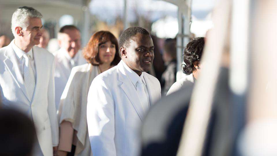 Elder Edward Dube of the Seventy (center) and Bishop Gérald Caussé, presiding bishop of the Church (left), participated in the cornerstone ceremony as well as the dedication of the Meridian Idaho Temple, Sunday, Nov. 19, 2017. Photo: Intellectual Reserve Inc.