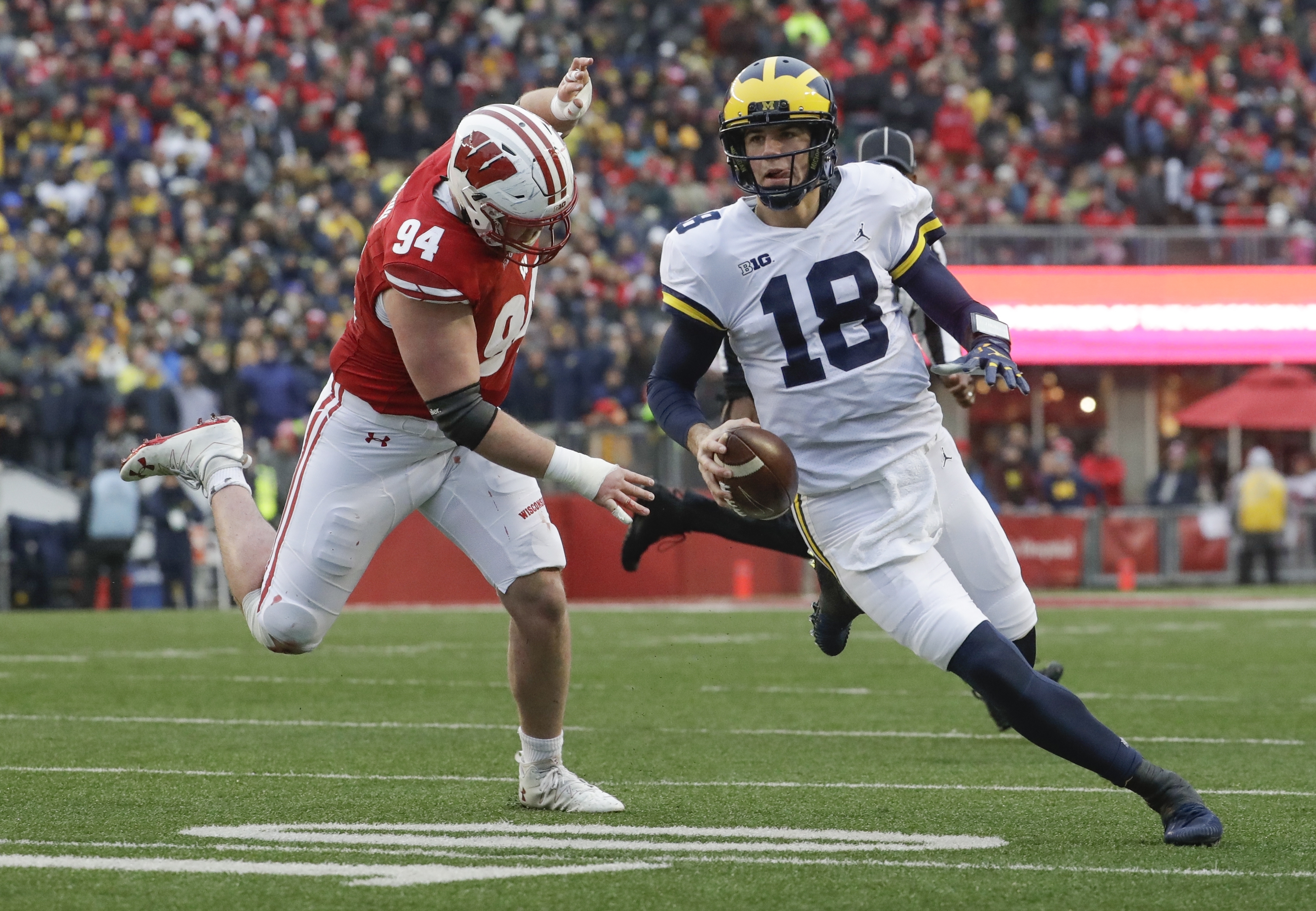 Harbaugh says Michigan QB Peters in concussion protocol