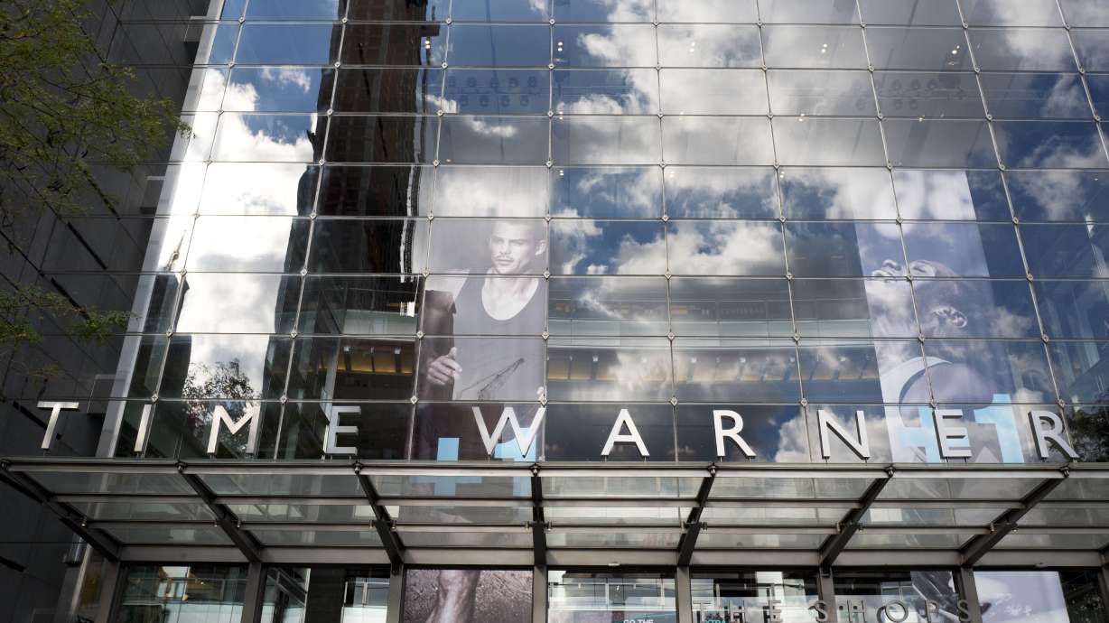 Justice Dept. sues to stop AT&T's $85B Time Warner deal