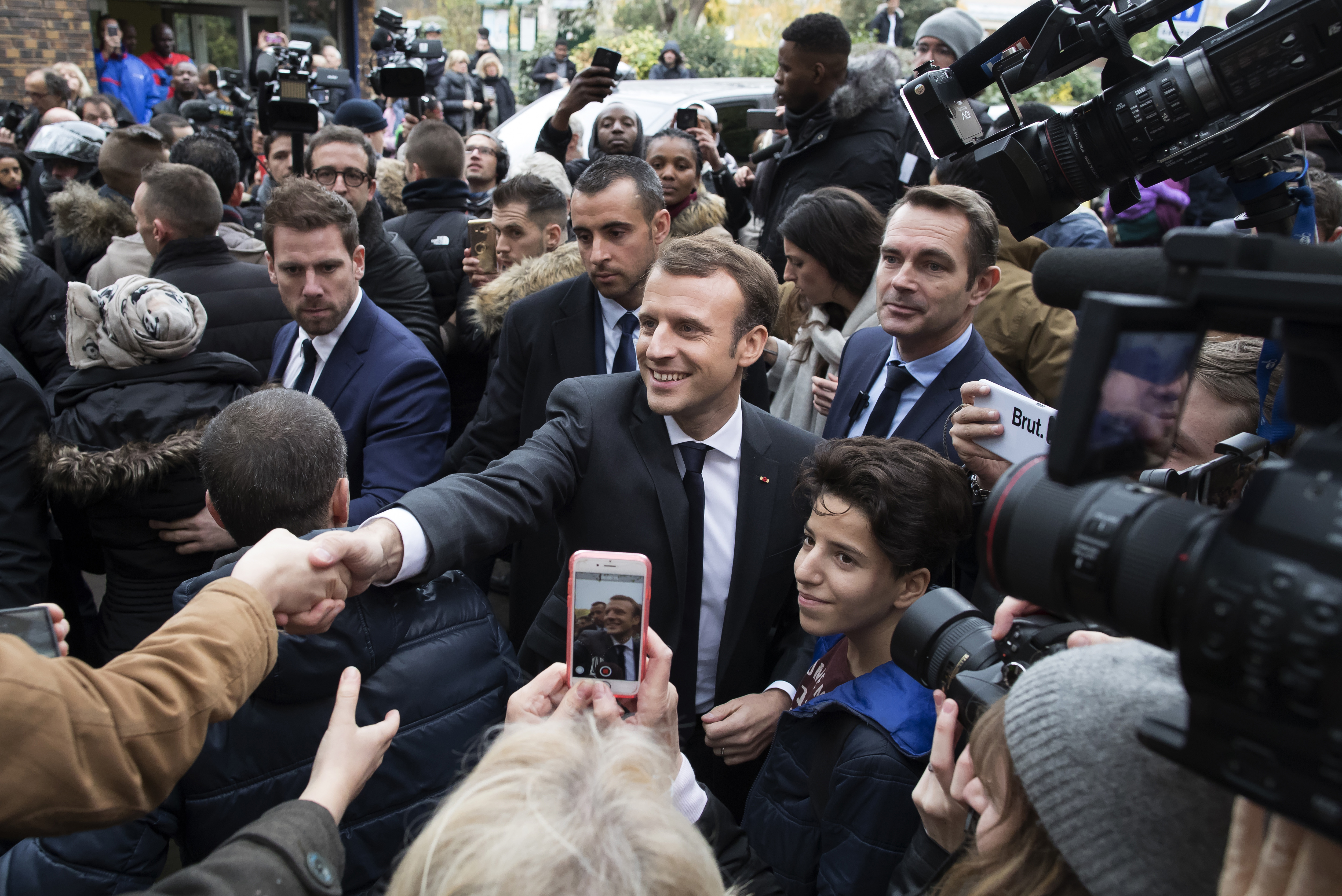 Macron takes Europe's center stage while Merkel falters