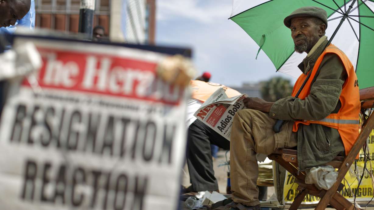 The Latest: Zimbabwe's Mnangagwa kept contact with military