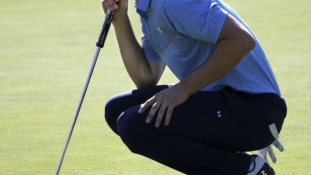 Day and Spieth go in opposite directions at Australian Open