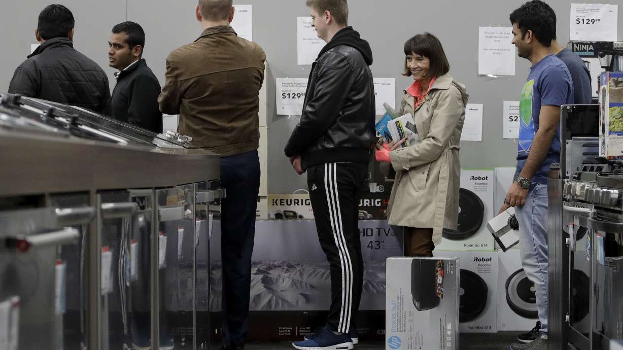 The Latest: Macy's says it's fixed gift, credit card issue