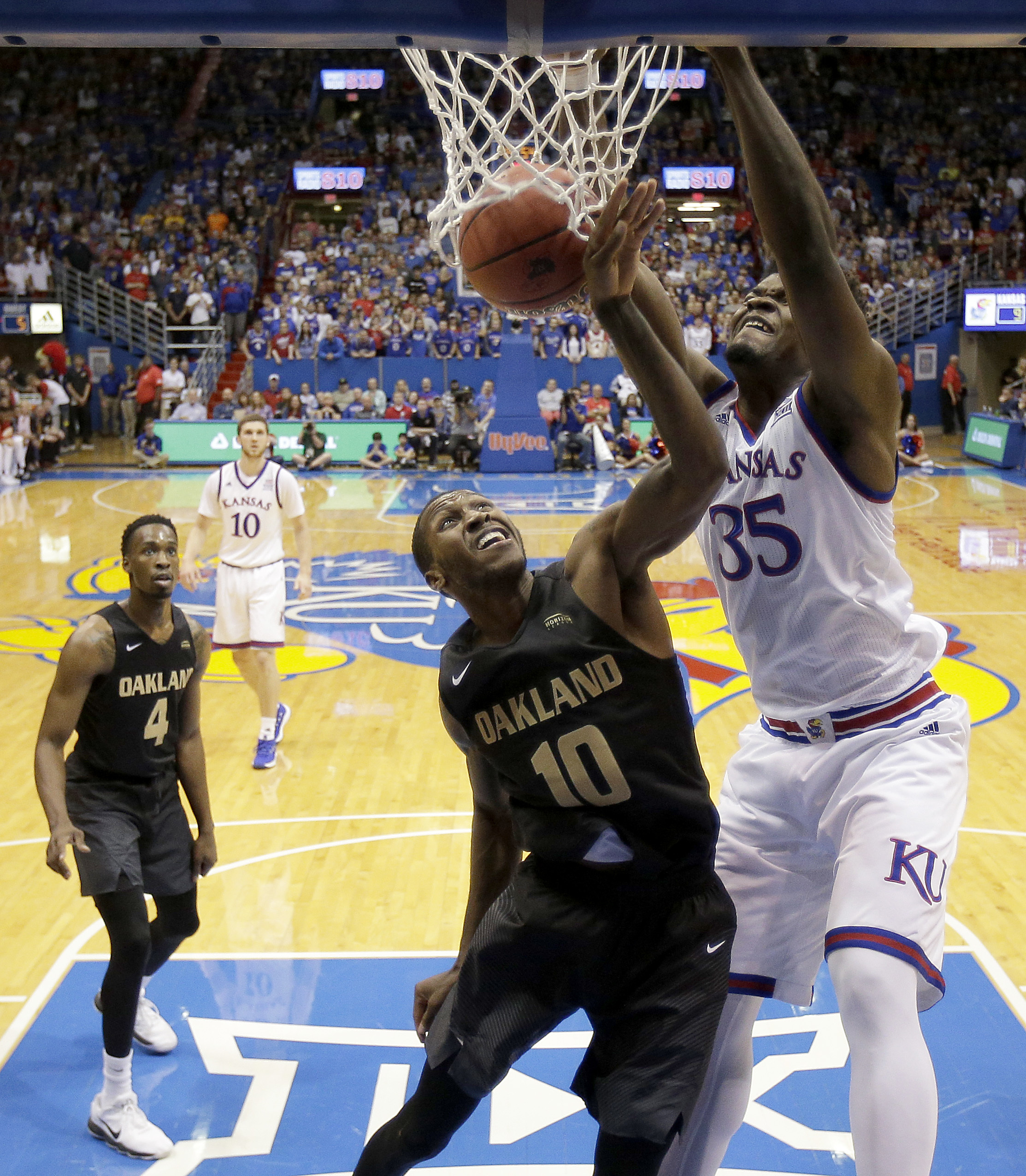 No. 3 KU with 7 in double figures in 102-59 rout of Oakland