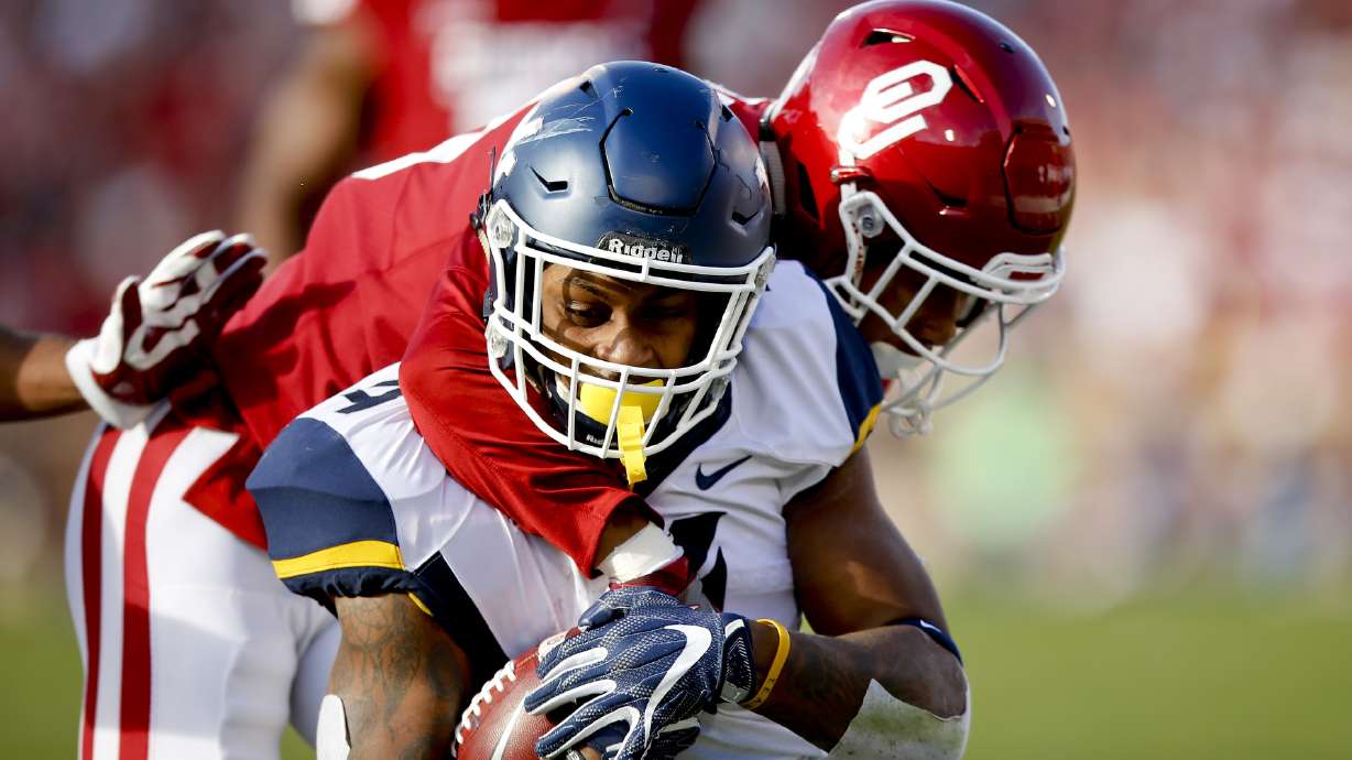 Mayfield leads No. 3 Oklahoma past West Virginia, 59-31