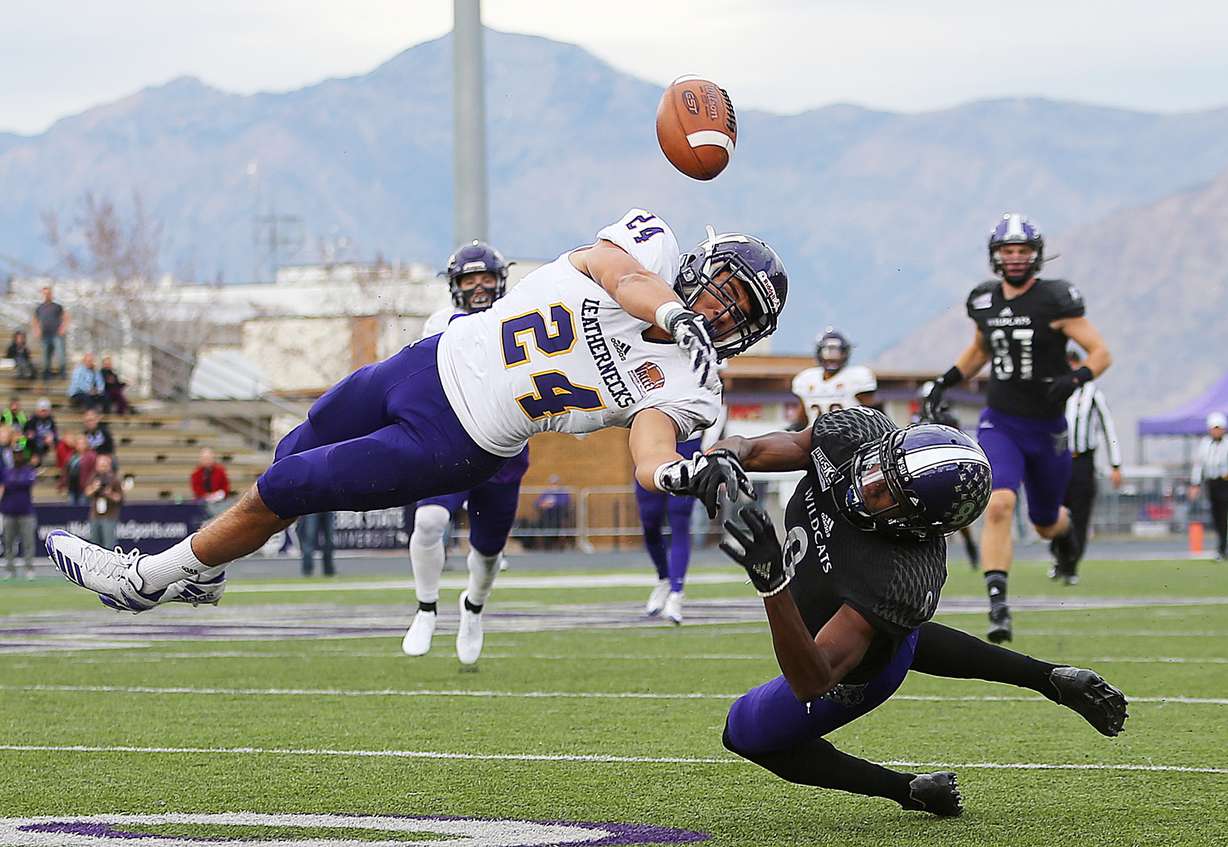 Western Illinois Leathernecks defensive back Mike Viti (24) knocks the ball away from Weber State Wildcats wide receiver Rashid Shaheed (8) as Weber State vs. Western Illinois play at Stewart Stadium in Ogden Utah on Saturday, Nov. 25, 2017.