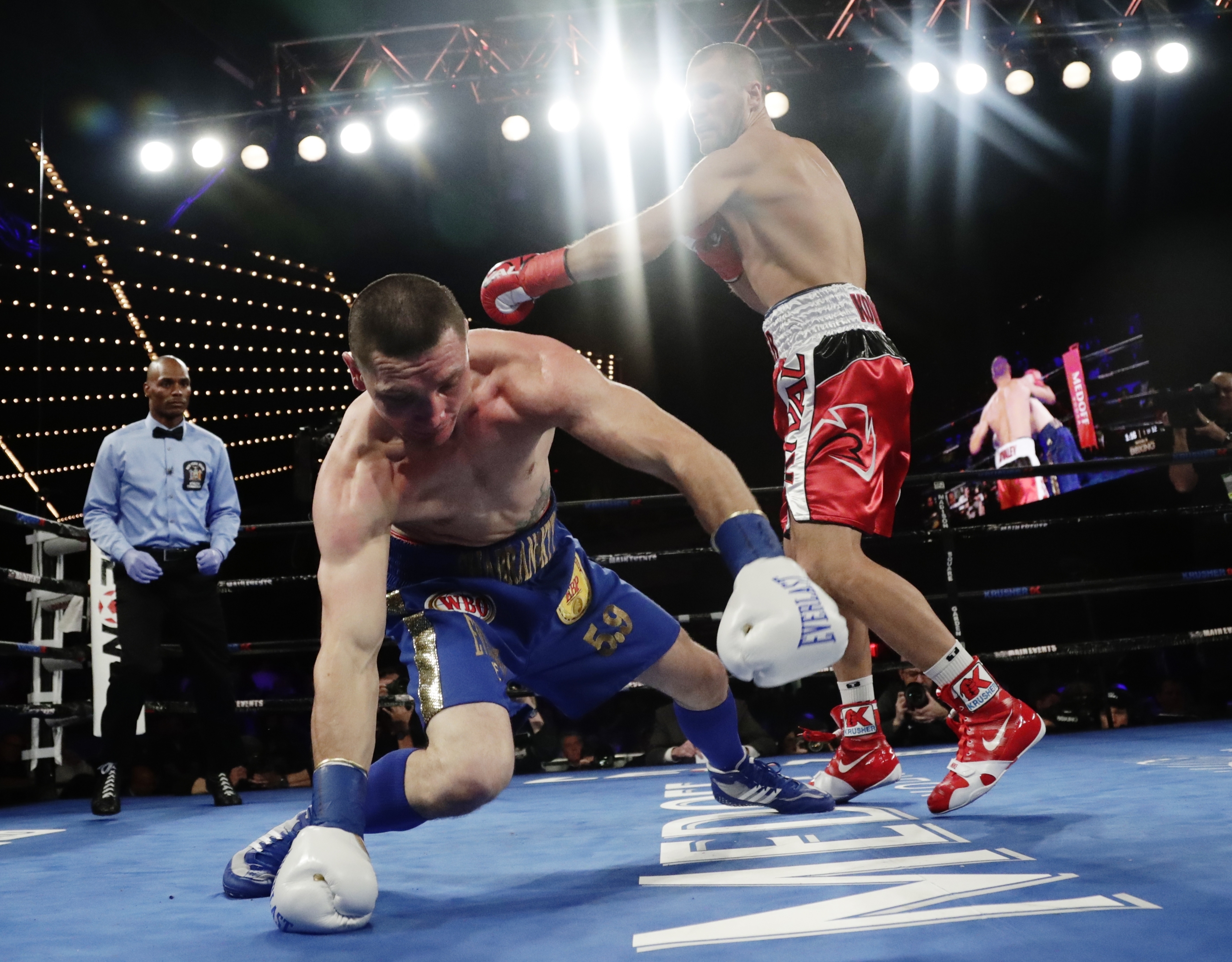 Kovalev knocks out Shabranskyy in 2nd round of title fight