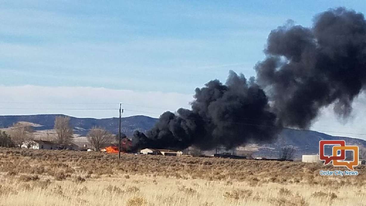 High winds blow brush fire into home near Cedar City