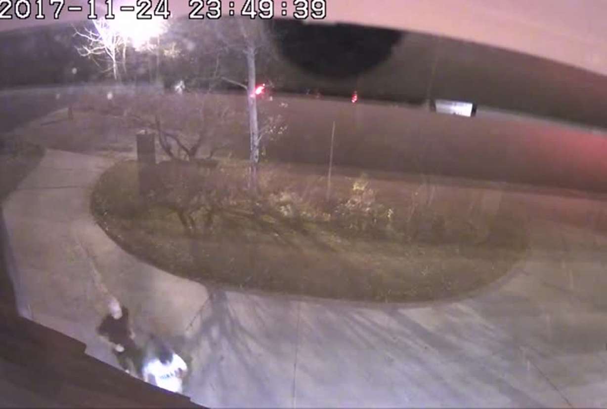 Surveillance video shows two people running toward the house. Photo: Steve Breinholt, KSL TV