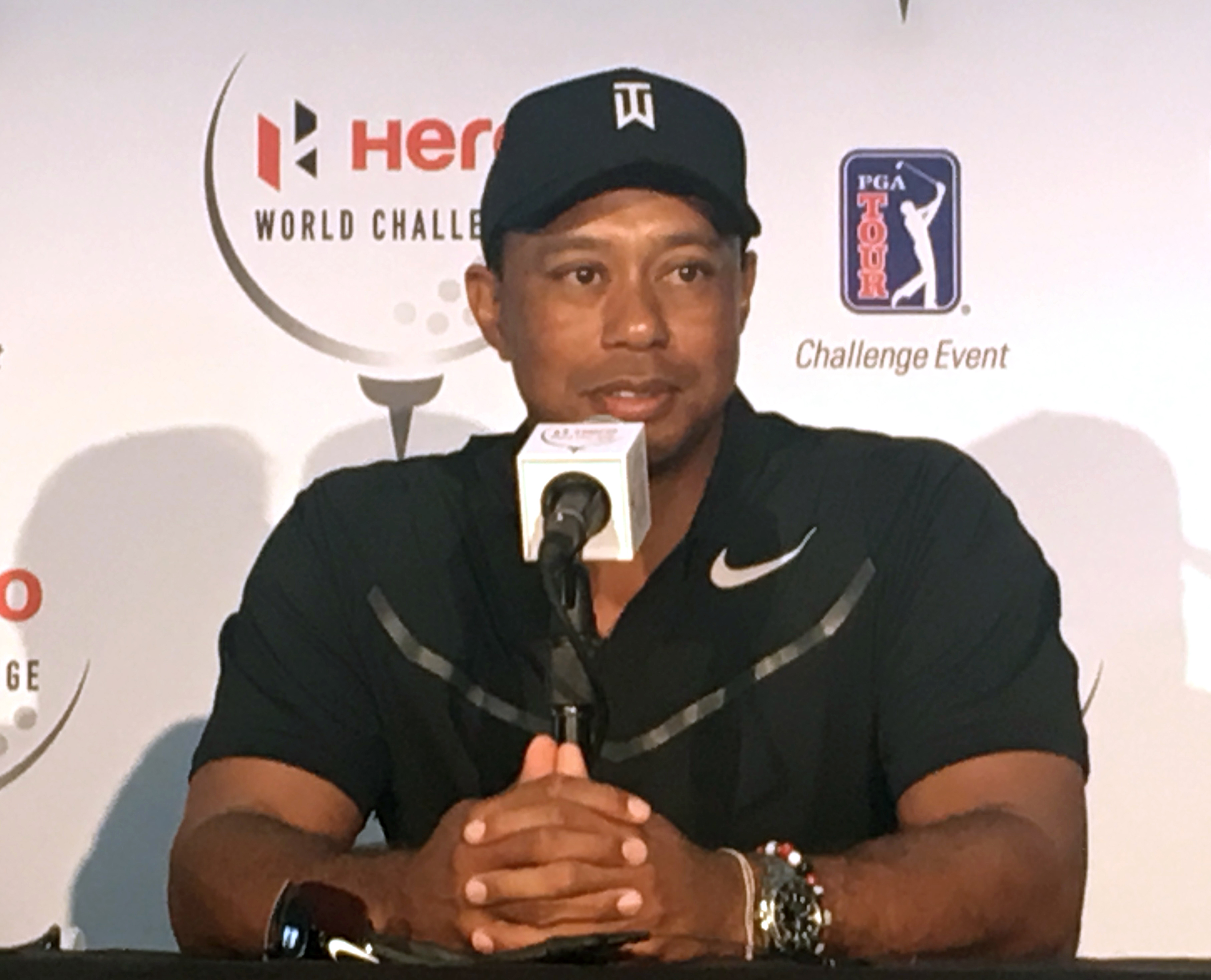 Woods says he's on the 'other side' of pain, loving life
