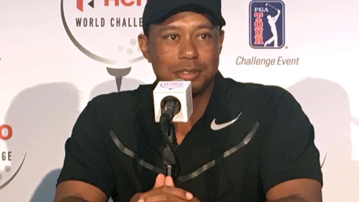 Woods says he's on the 'other side' of pain, loving life
