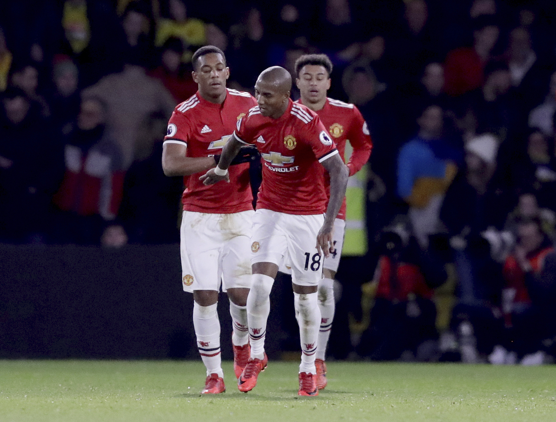 Man United beats Watford 4-2 to keep in sight of City