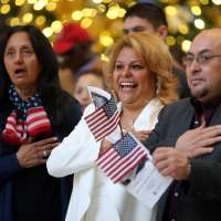 125 sworn in as new U.S. citizens