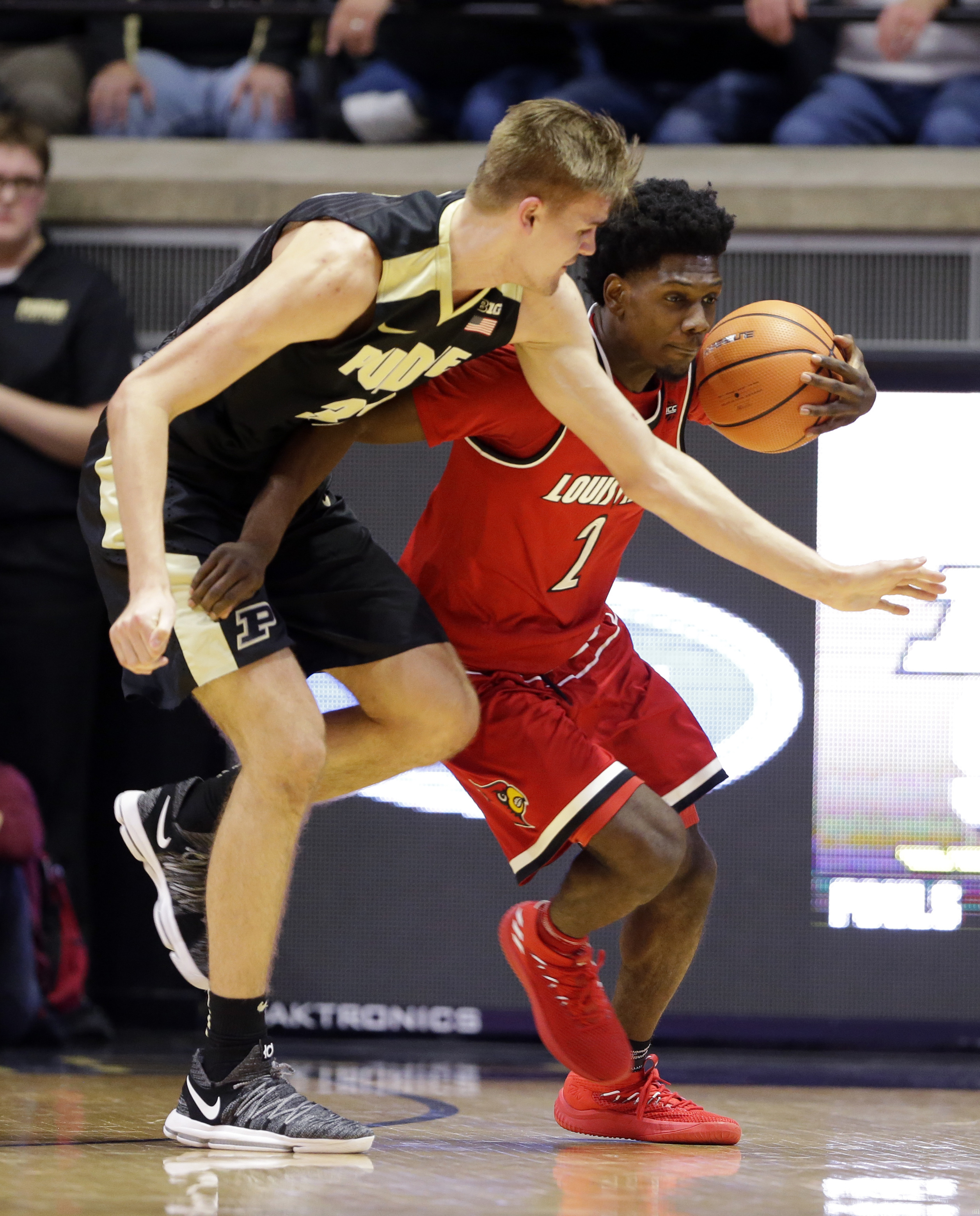 Purdue uses size advantage to upend No. 17 Louisville 66-57