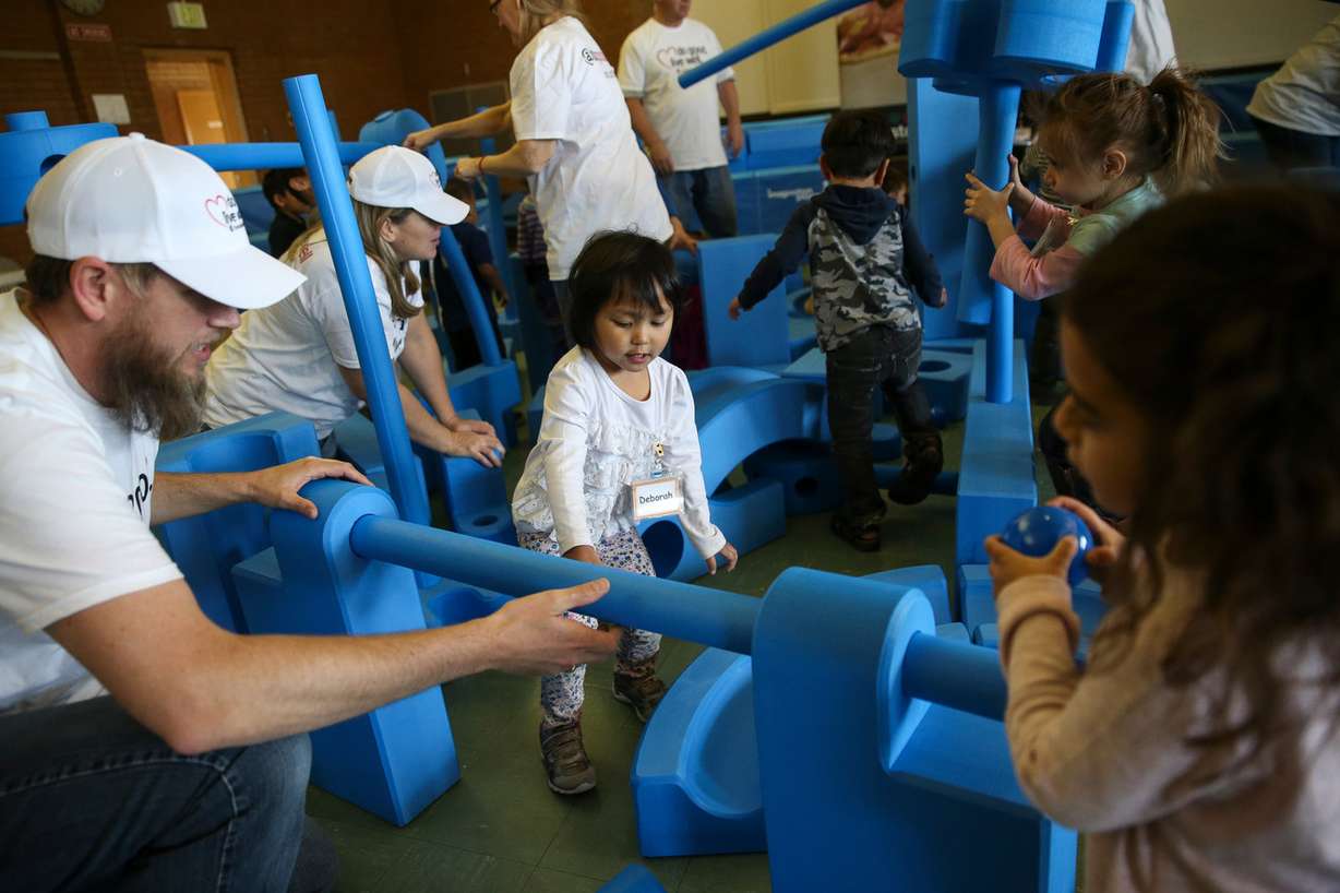 Chad Hilton, left, Deborah and other children in the Utah Community Action Head Start program play with the Imagination Playground in a Cart at Utah Community Action in Salt Lake City on Wednesday, Nov. 29, 2017. (Photo: Spenser Heaps, KSL)