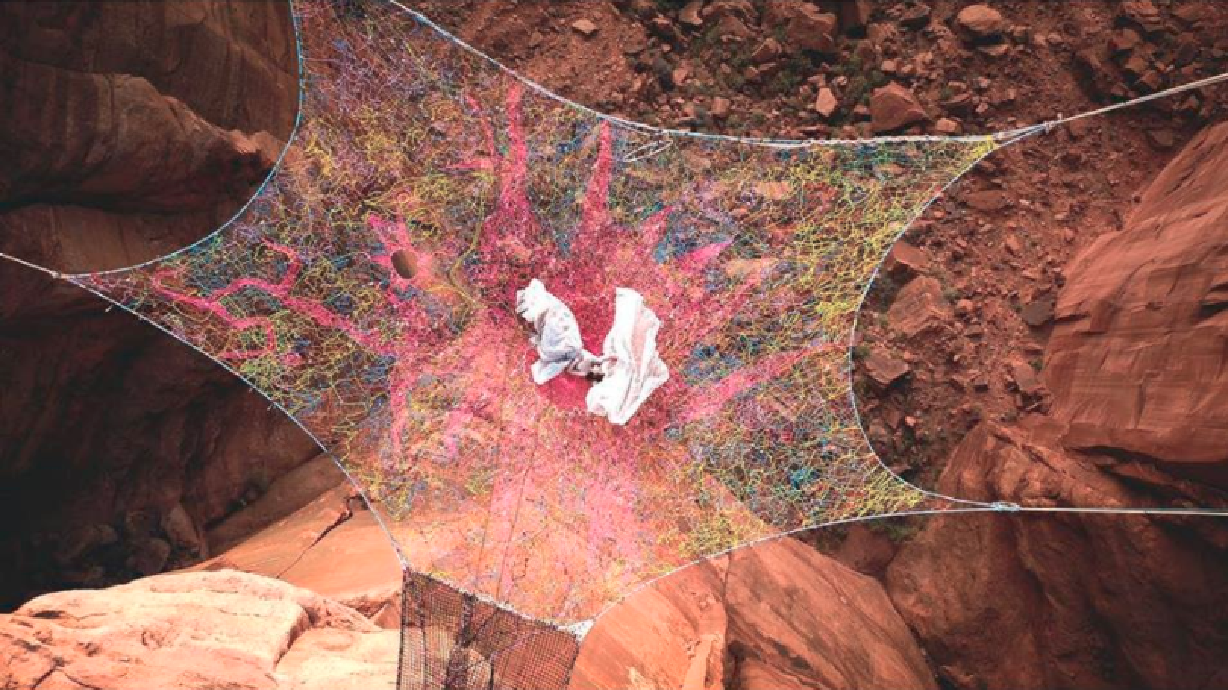 California couple gets married on space net suspended over Moab canyon