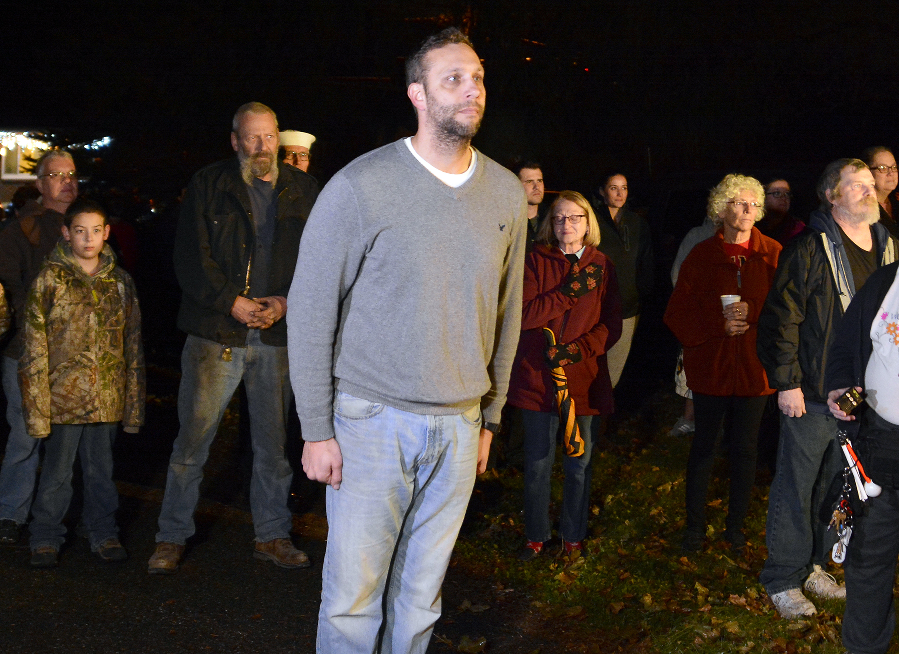 The Latest: Man's loudspeaker broadcast of taps ends