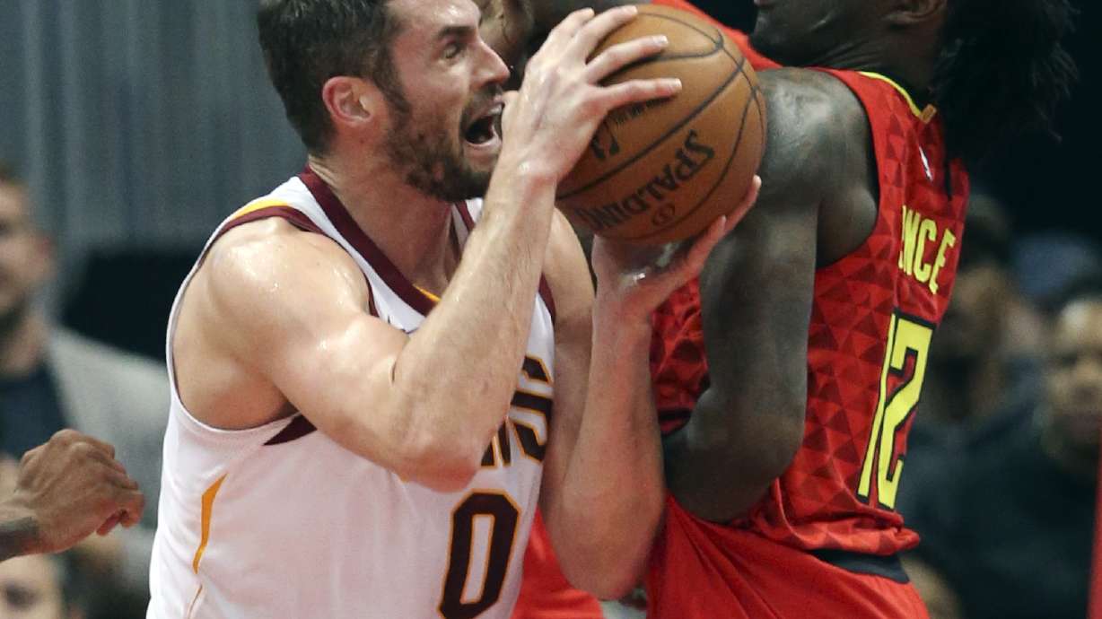 James, Love power Cavs past Hawks for 10th win in a row