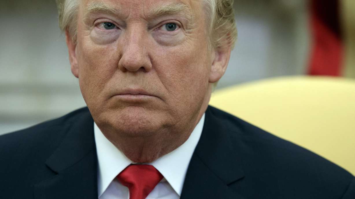 The Latest: Trump says Tillerson ouster is 'fake news'