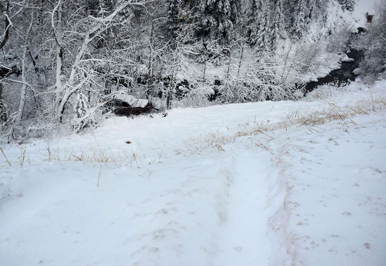 A vehicle involved in a head-on collision during one of the first winter storms of the year in Big Cottonwood Canyon is pictured on Friday, Nov. 17, 2017. Brittany Kidd, a Utah Department of Transportation patrol driver, was injured in the collision. The occupants of the other vehicle jumped out of it before it slid approximately 250 feet down the embankment. (Photo: Utah Department of Transportation)